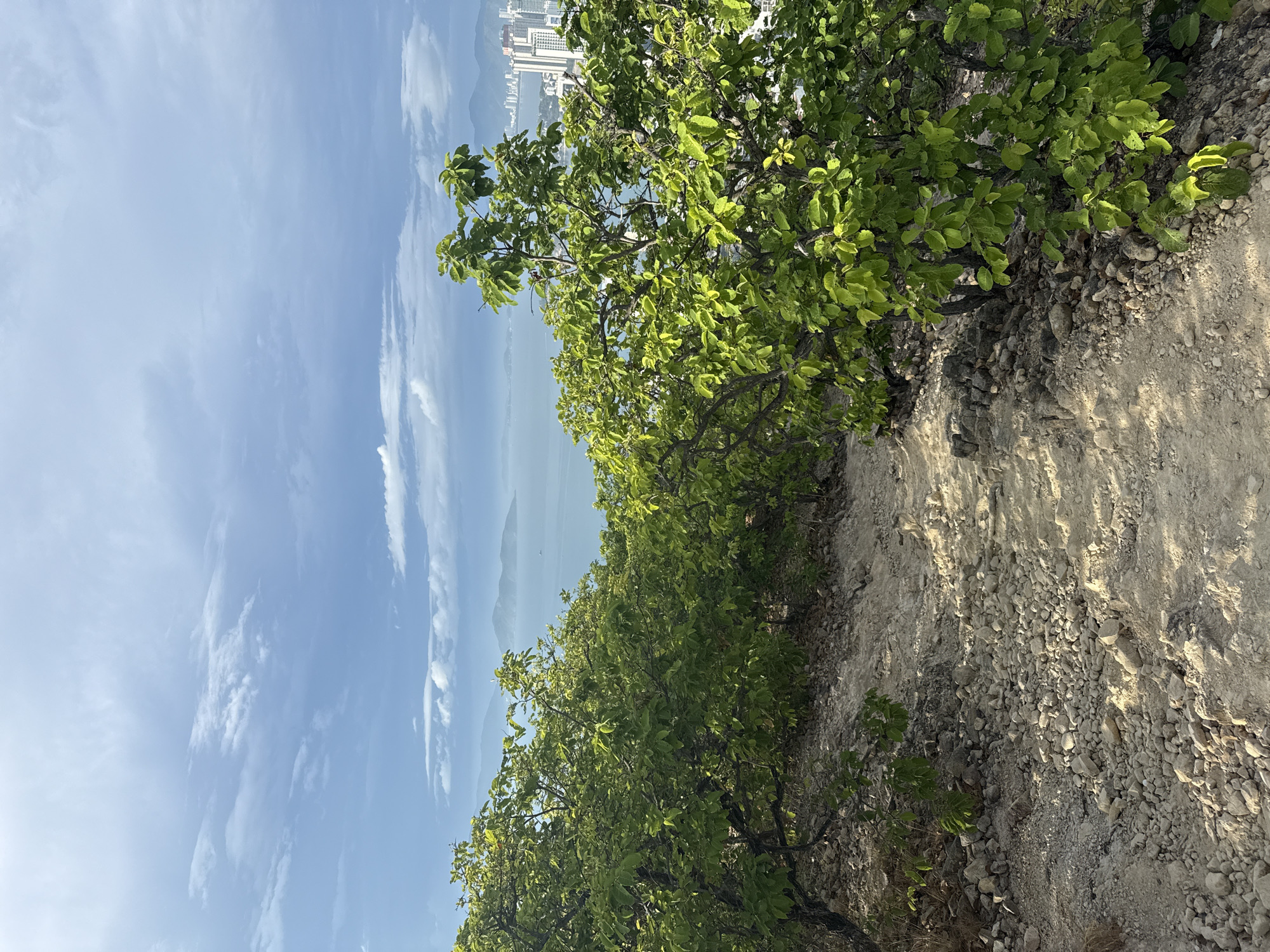 Evening hillside trek documents Nha Trang coastal views, cave exploration