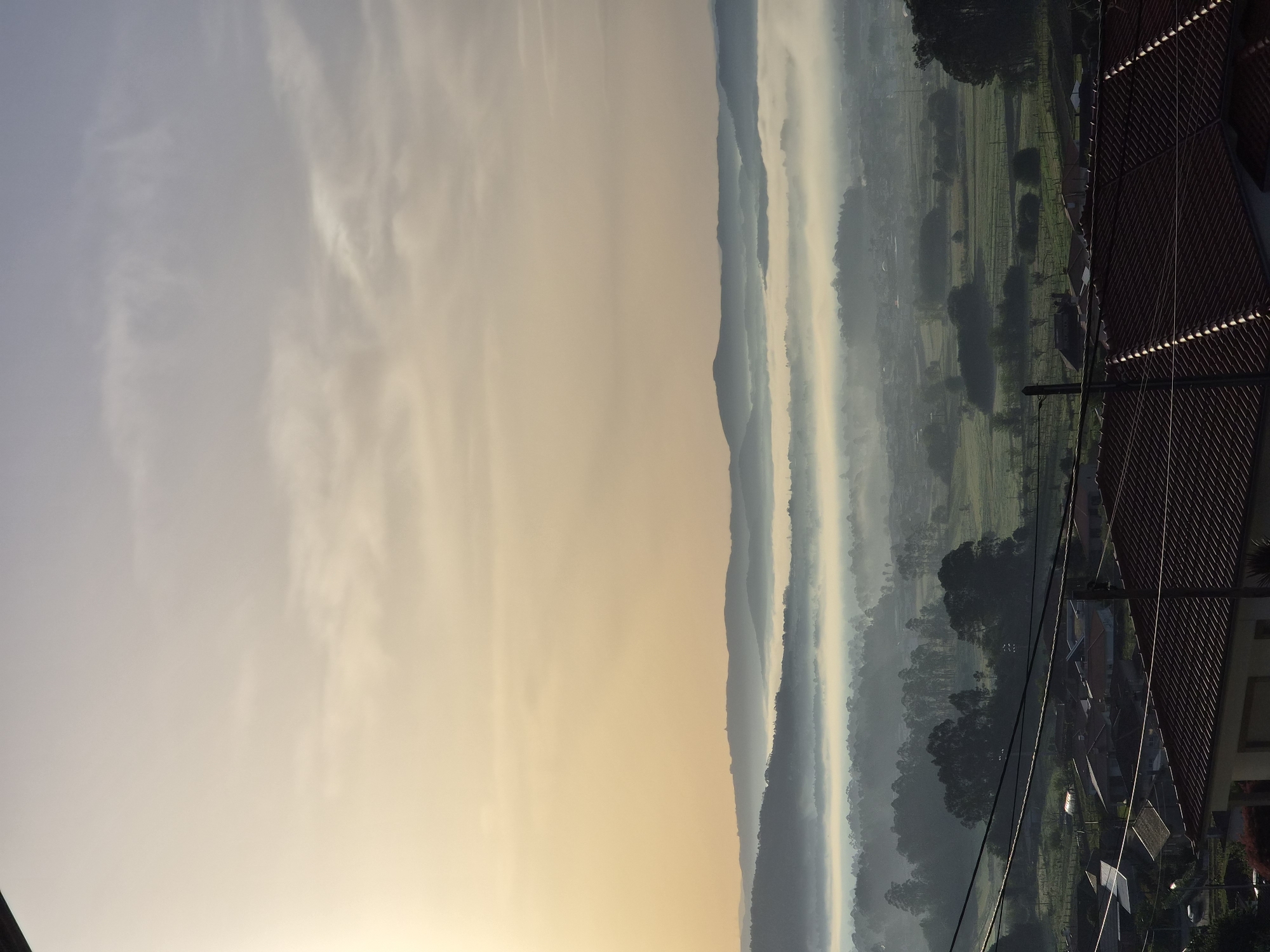 Sunrise observed over mountainous landscape in Barcelos, Portugal