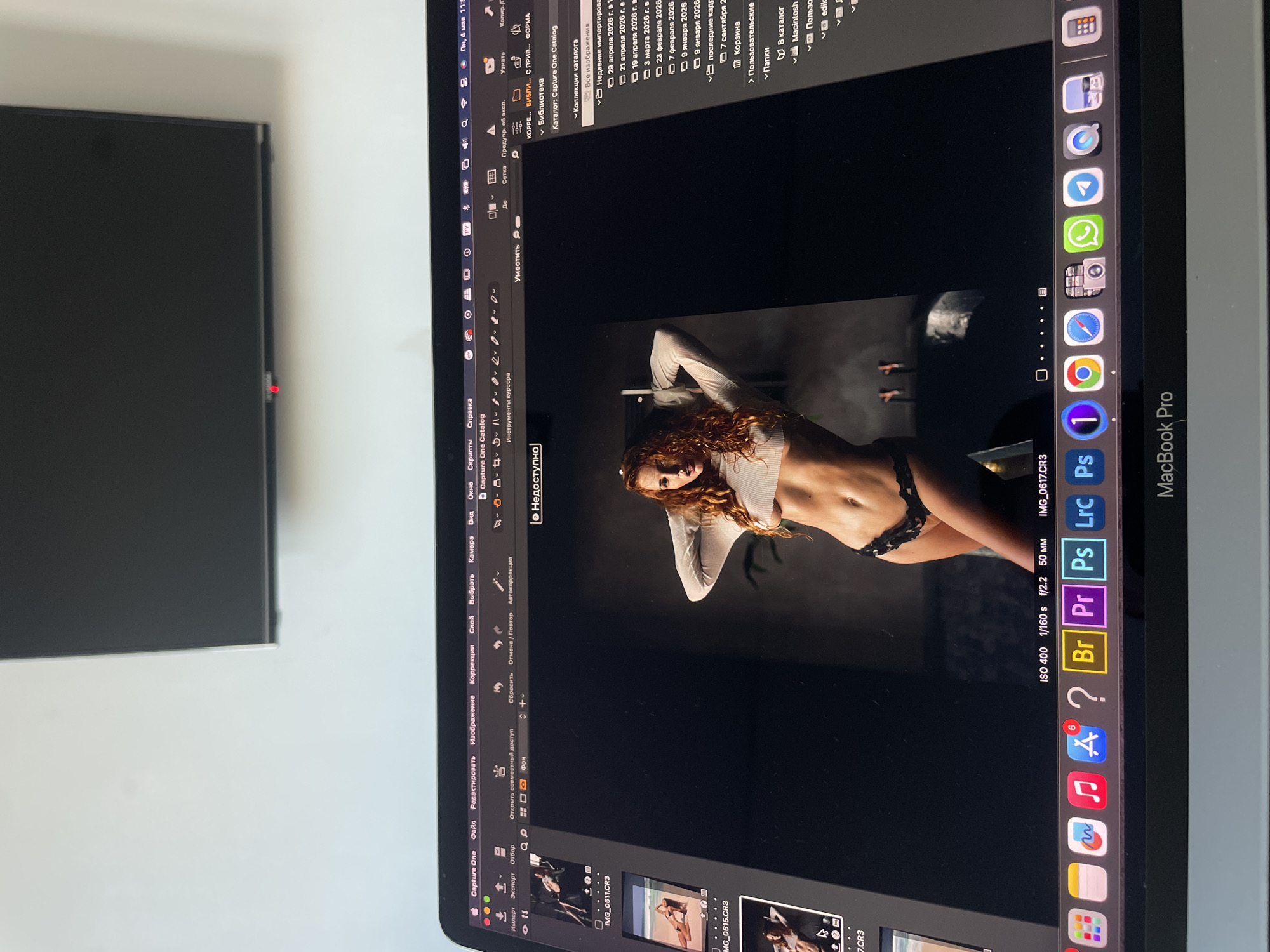 Photo editing session documented on MacBook in Kazan