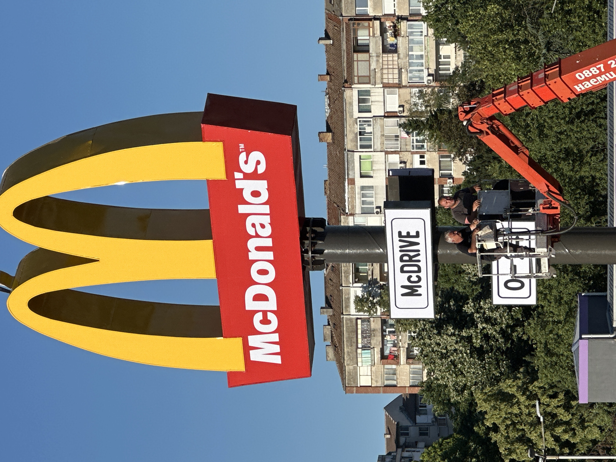 McDonald's sign installation with cranes in Veliko Tarnovo
