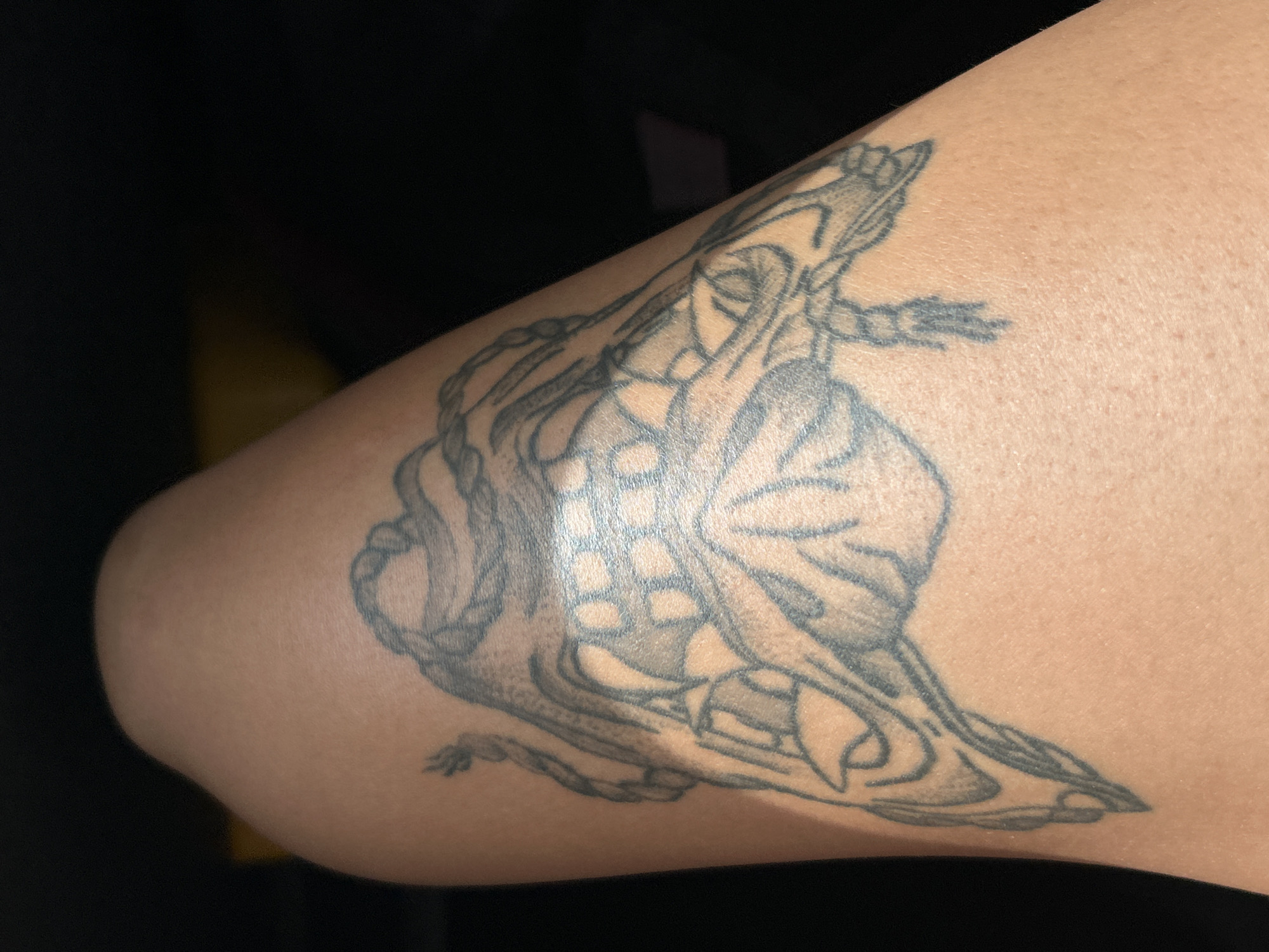 Black ink tattoo details from Phuket, August 2026