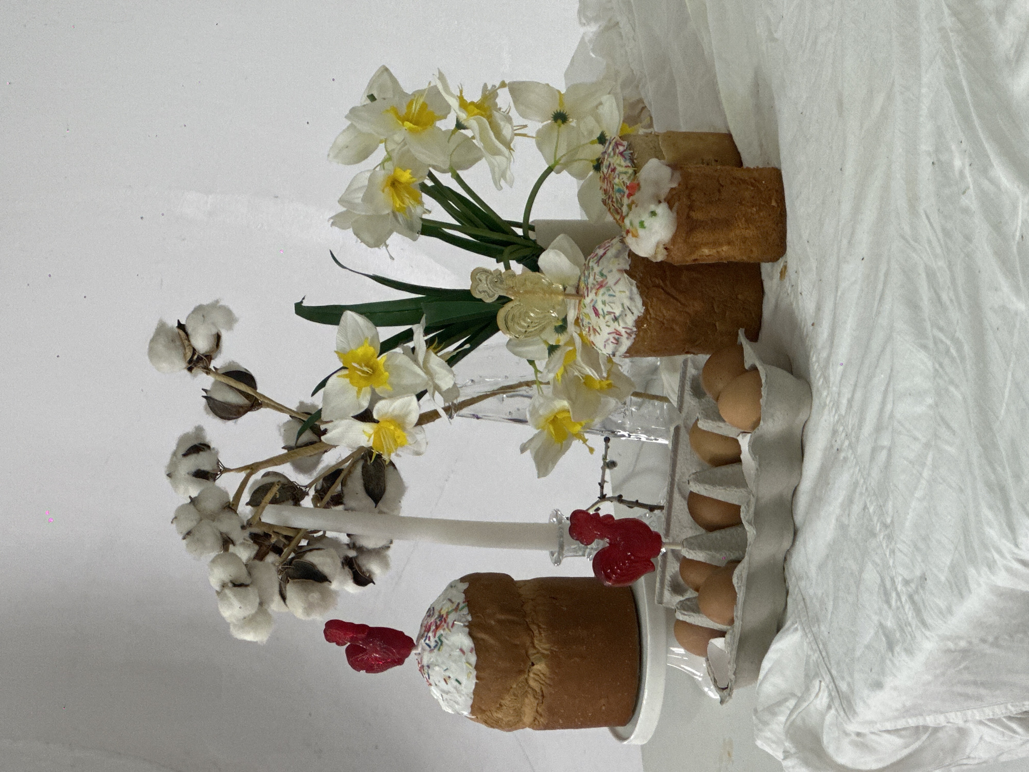 Child celebrates Easter morning with decorated eggs in Chaikovsky