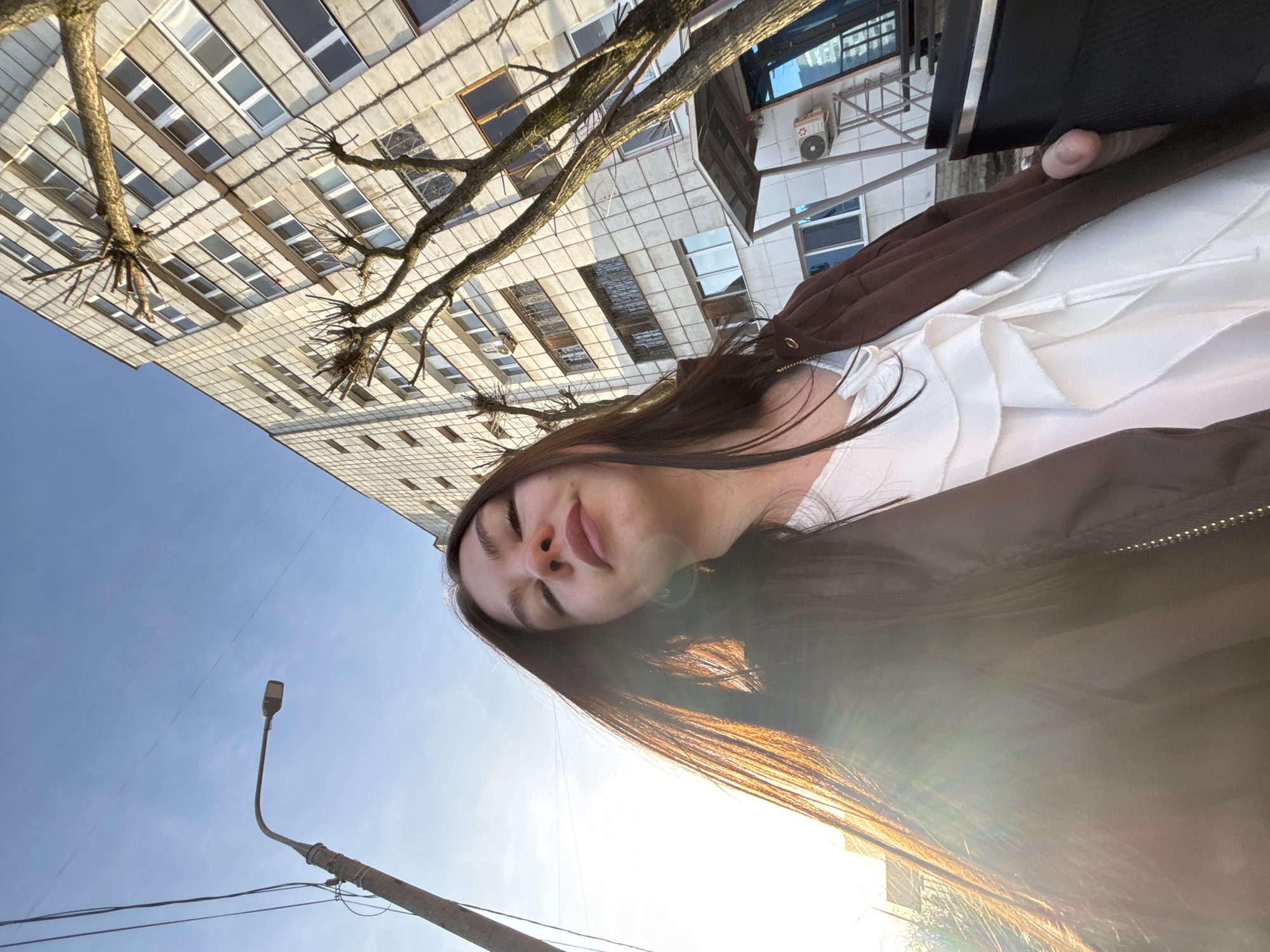 Woman photographed outdoors in Perm during early morning hours