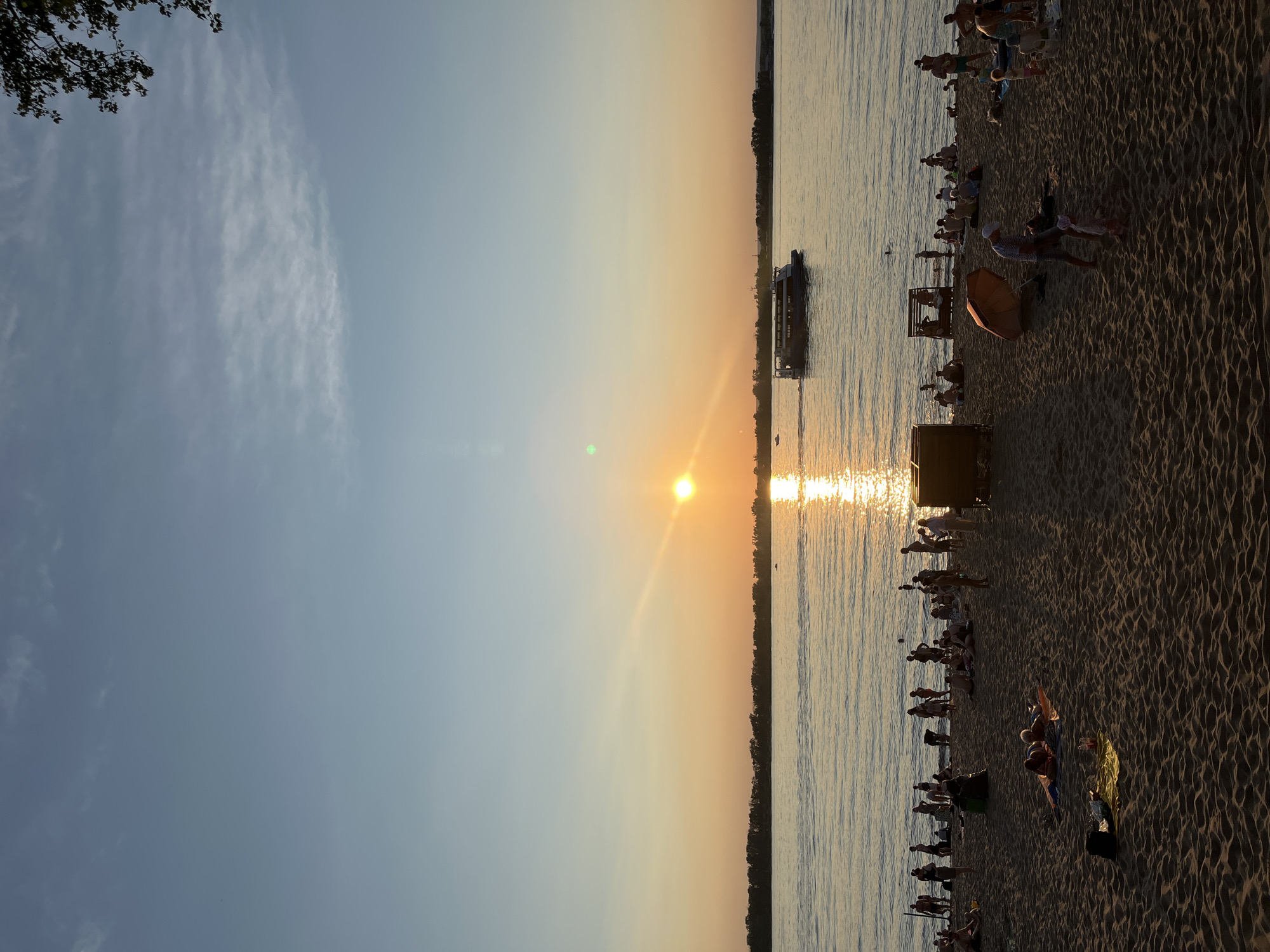 Sunset beach scene on a warm July evening in Novokuybyshevsk