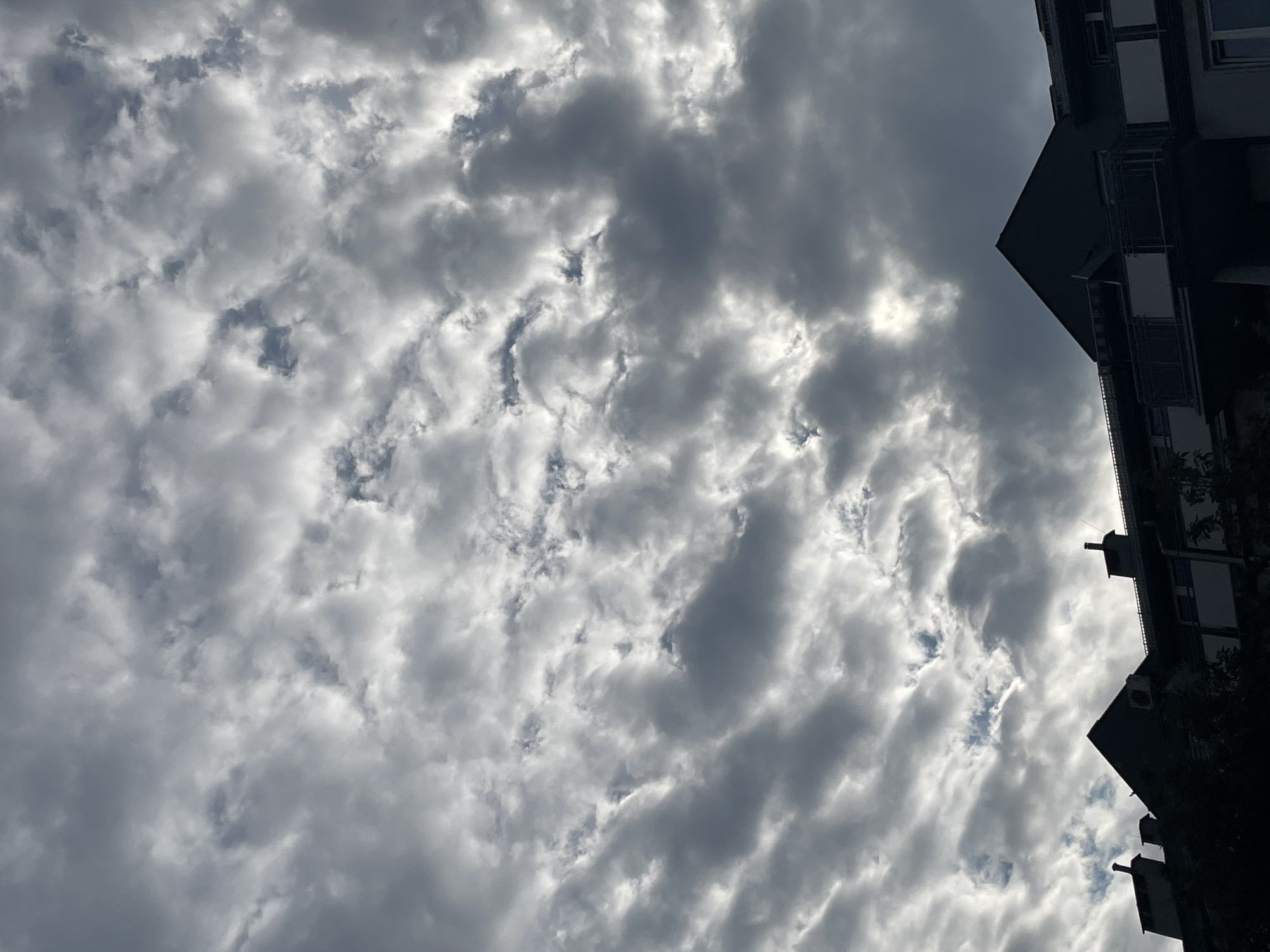 Urban witnesses document changing cloudscape from street level