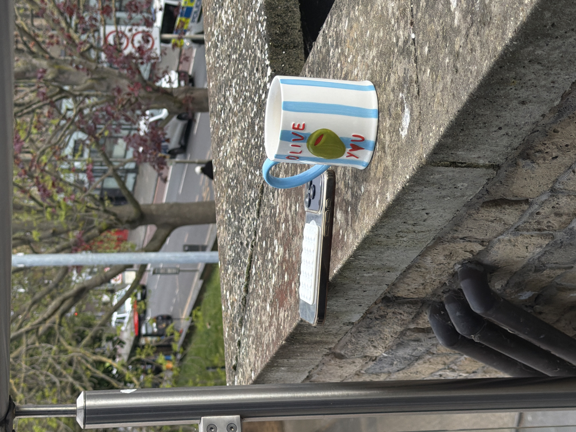 Coffee break captured on London street ledge Friday morning