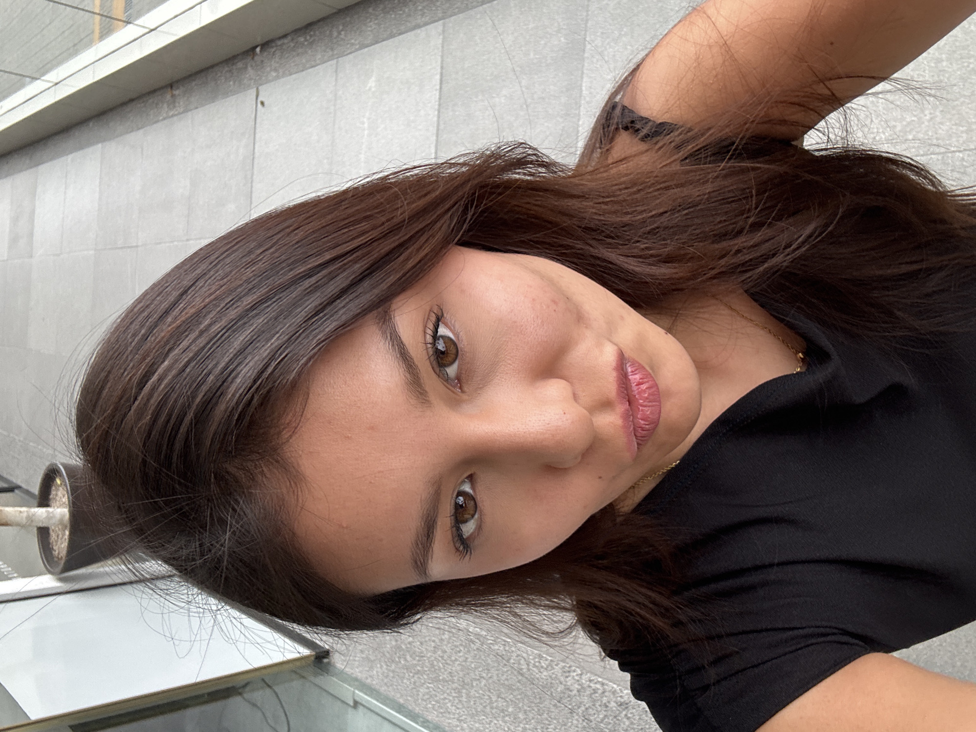 Woman takes selfie in San Bernardino Tlaxcalancingo, Mexico