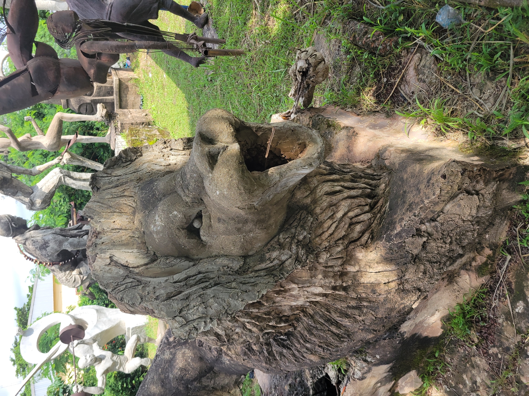 Touring an outdoor sculpture garden at a Nigerian fine arts department