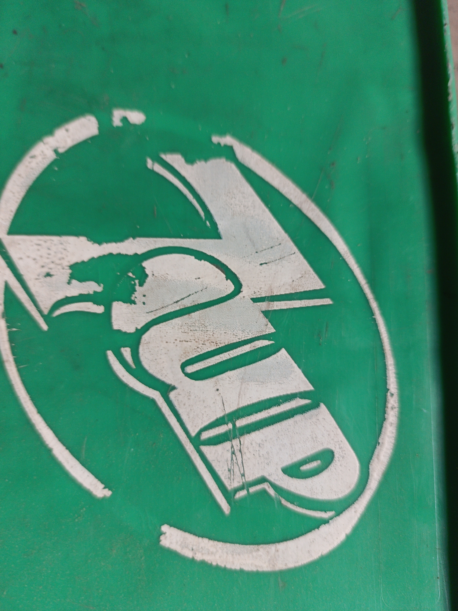 Ground debris and branded items observed at location