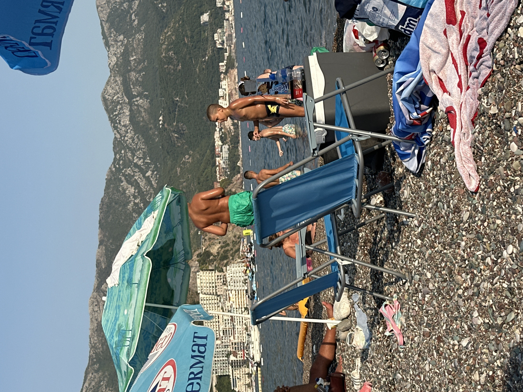 Parasailing and paragliding in full swing over Boreti, Montenegro