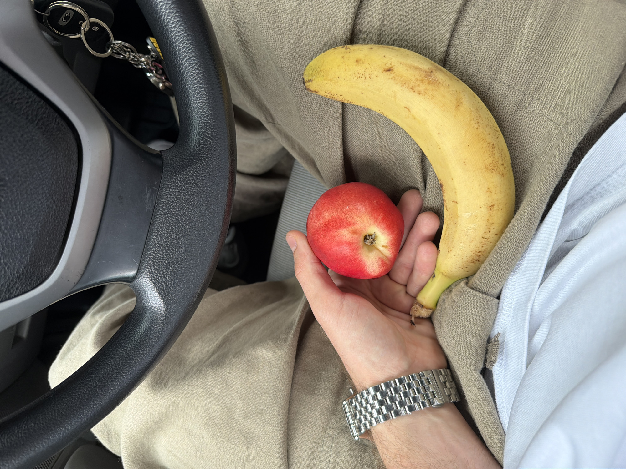 Fruit in hand and elevator selfie, Yerevan midday