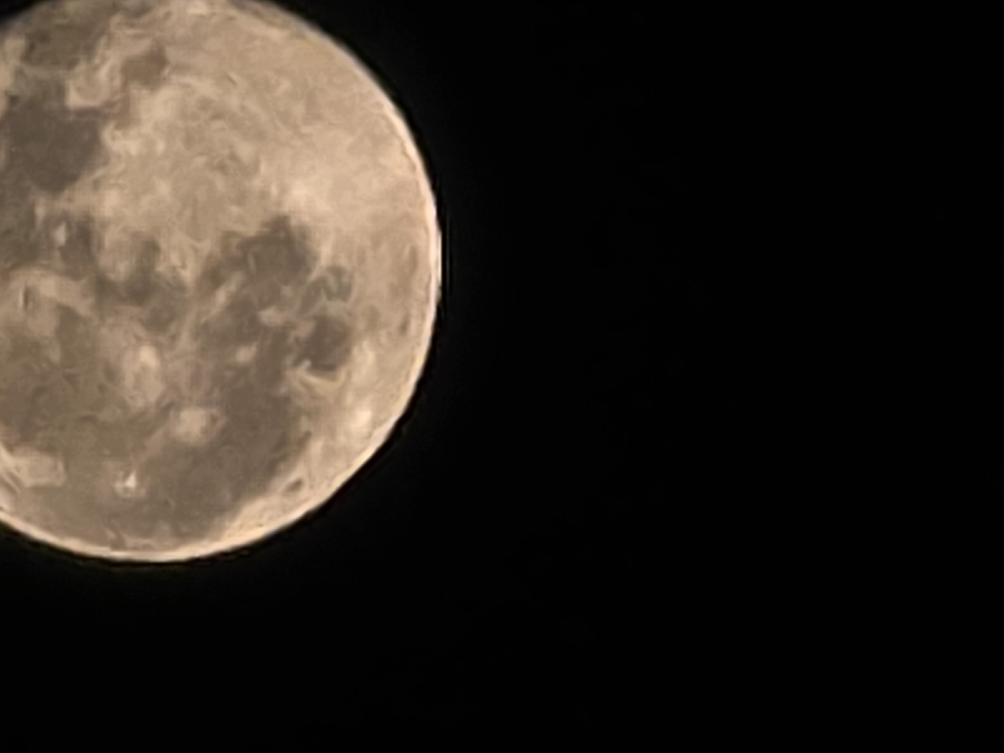 Full moon rising over Sofia, caught from the streets at dusk