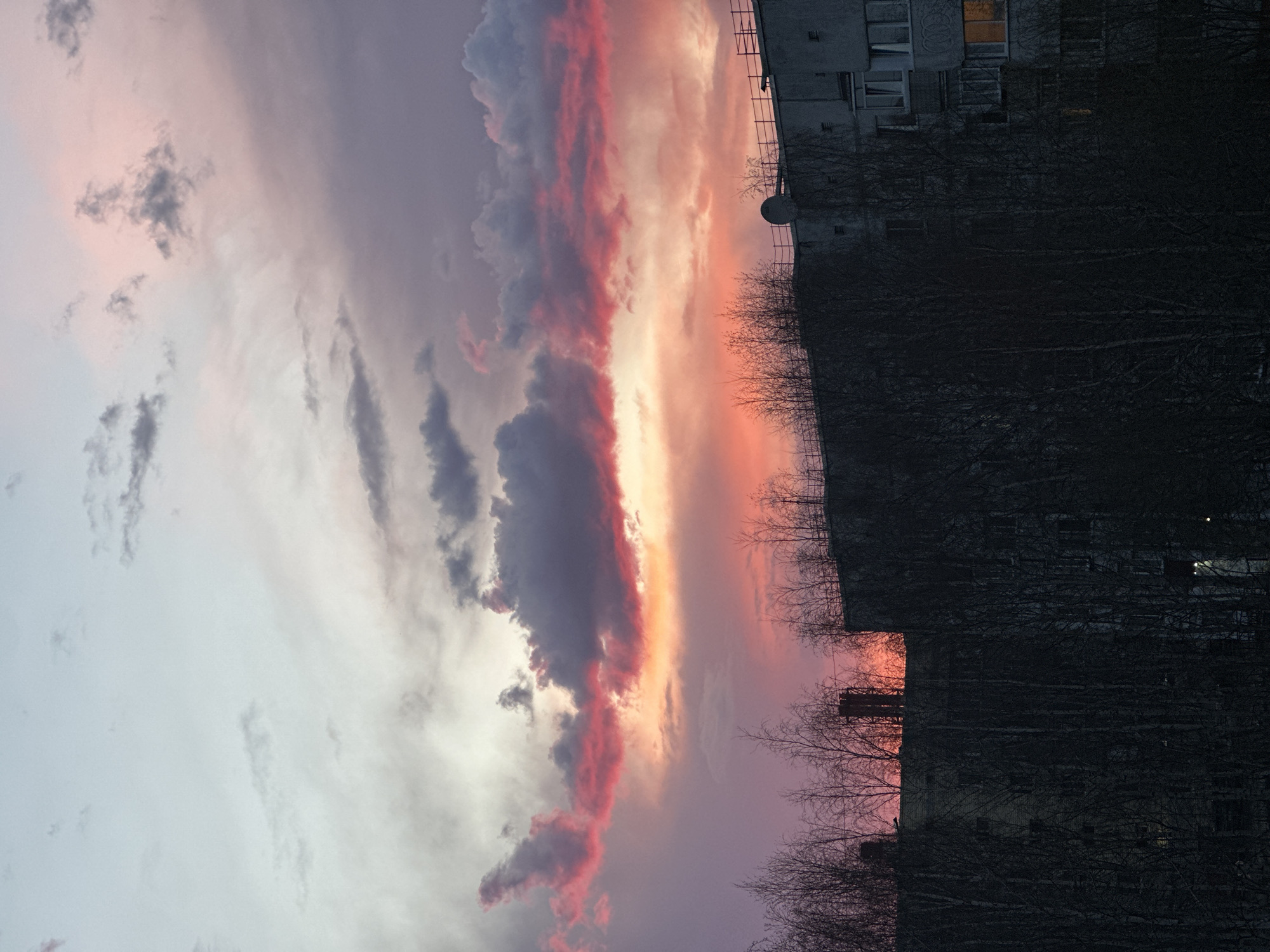 Dramatic sunset colors illuminate Surgut, Russia skyline