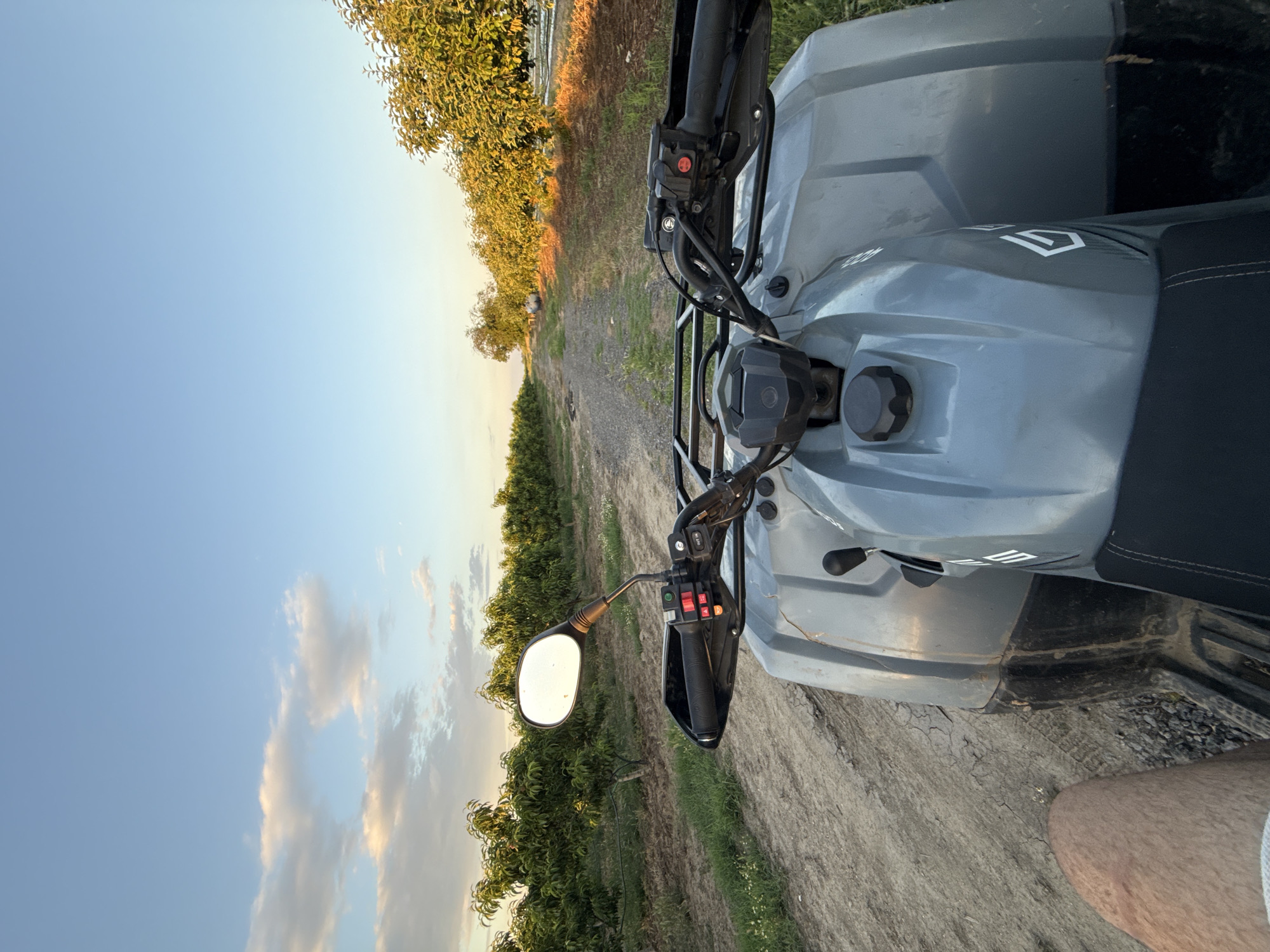 ATV rider traverses rural path in Panaretovtsi, Bulgaria