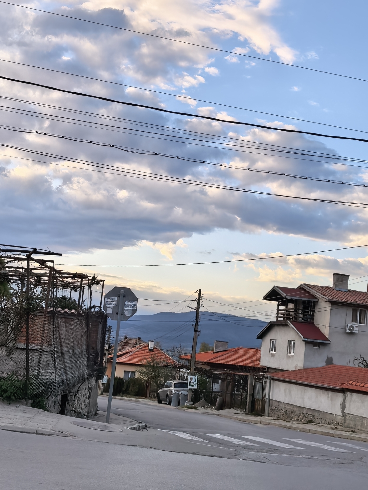 Urban street scenes captured during dramatic afternoon sky conditions