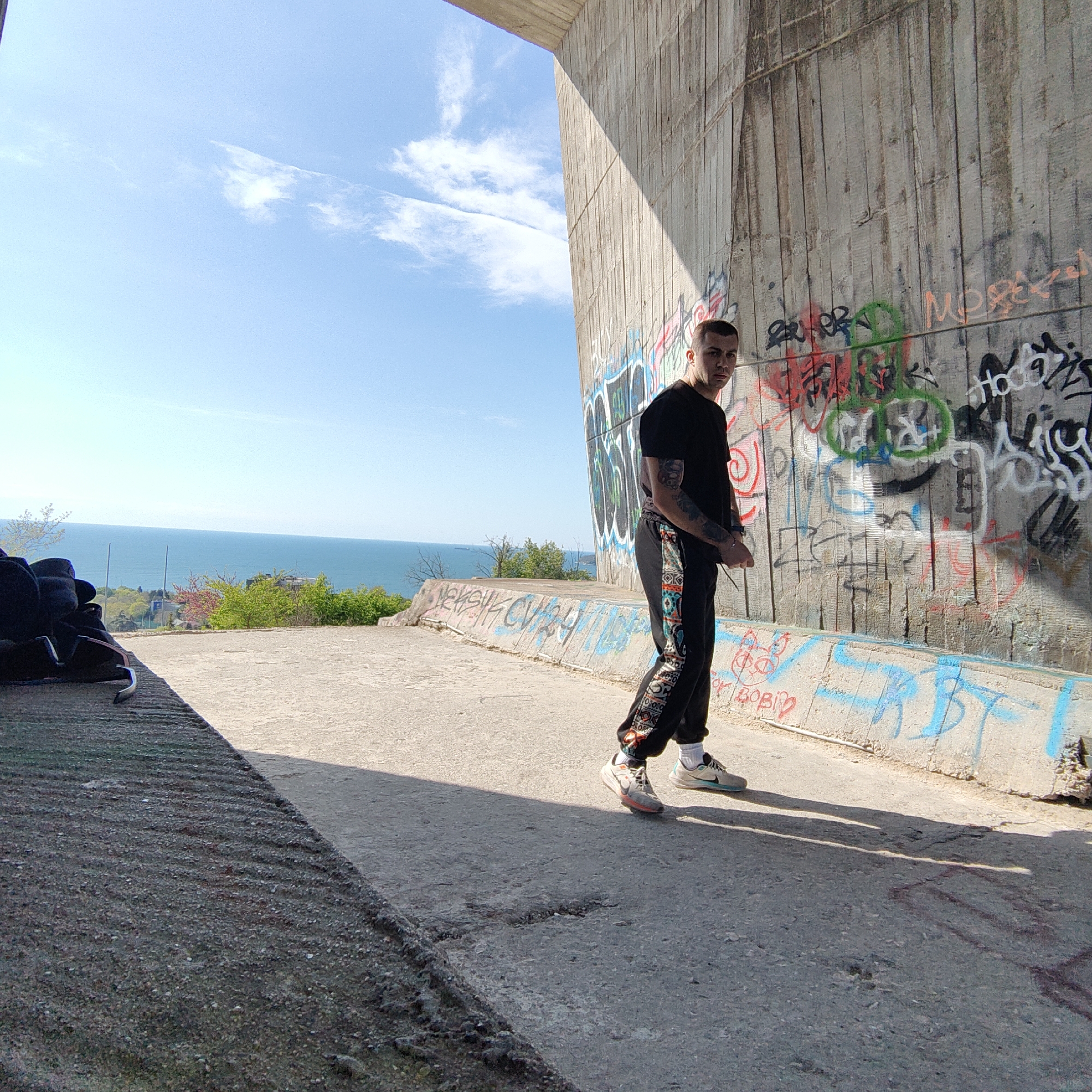 Man performs parkour backflips near Black Sea in Varna