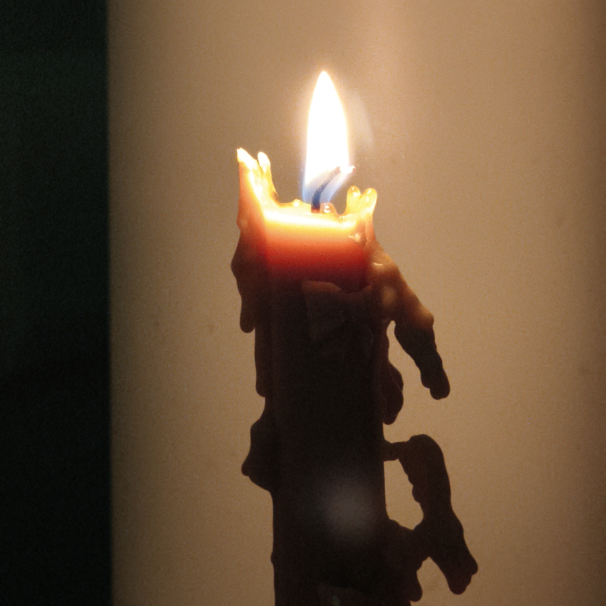Masked individual documents candle, knife in Belarus apartment