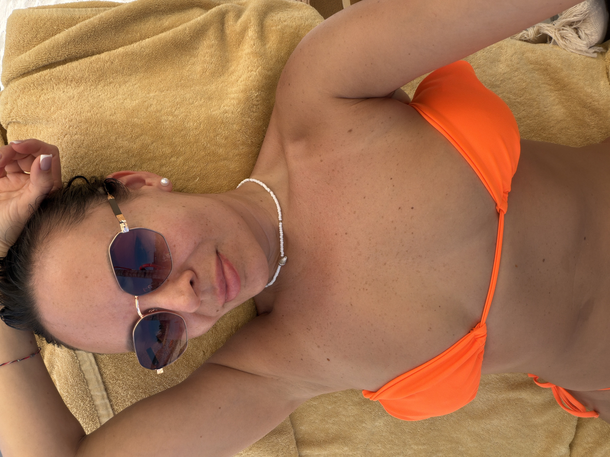 Woman enjoys morning beach resort activities in Nha Trang