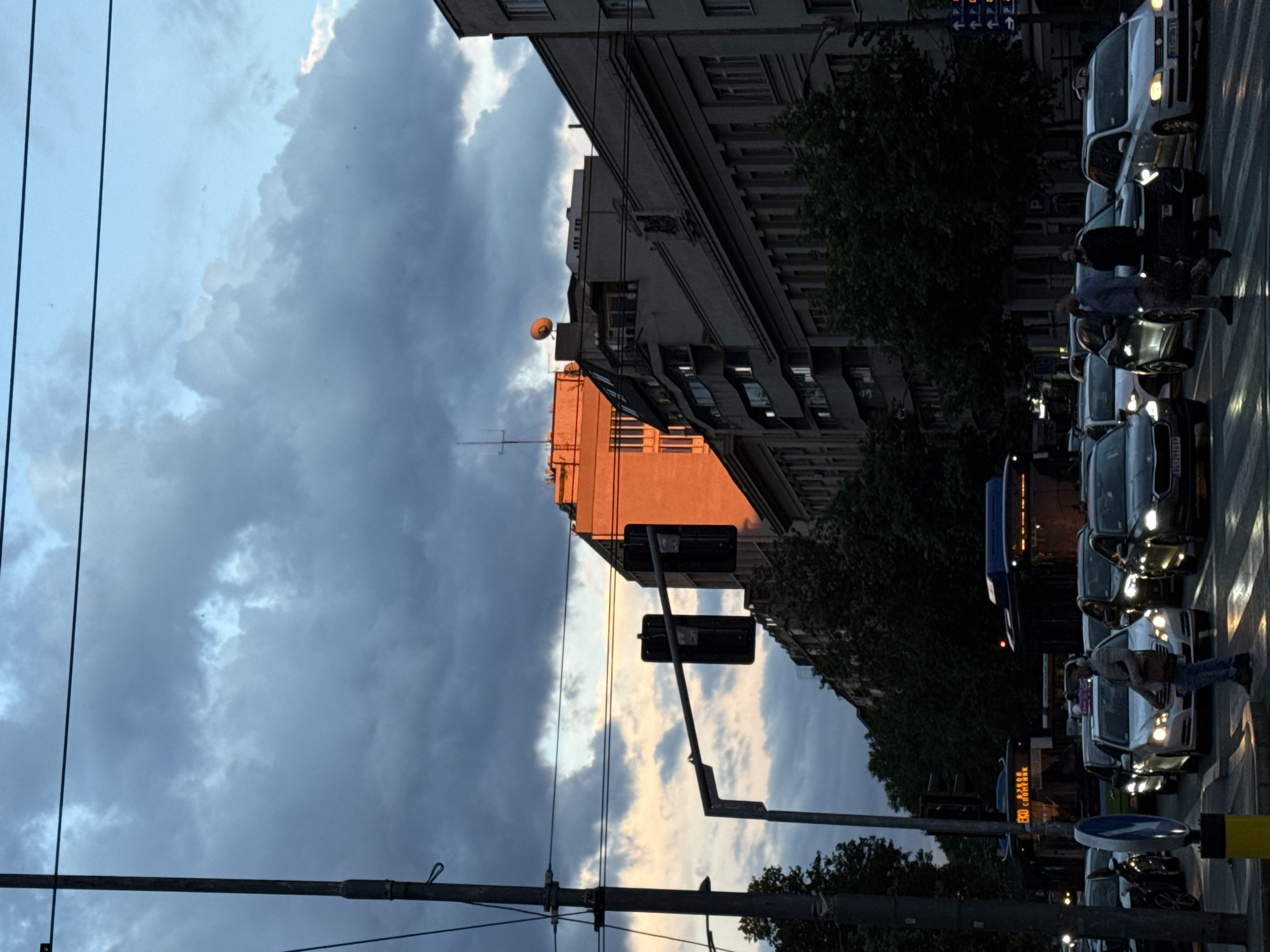 Belgrade city center at dusk, golden hour to storm clouds