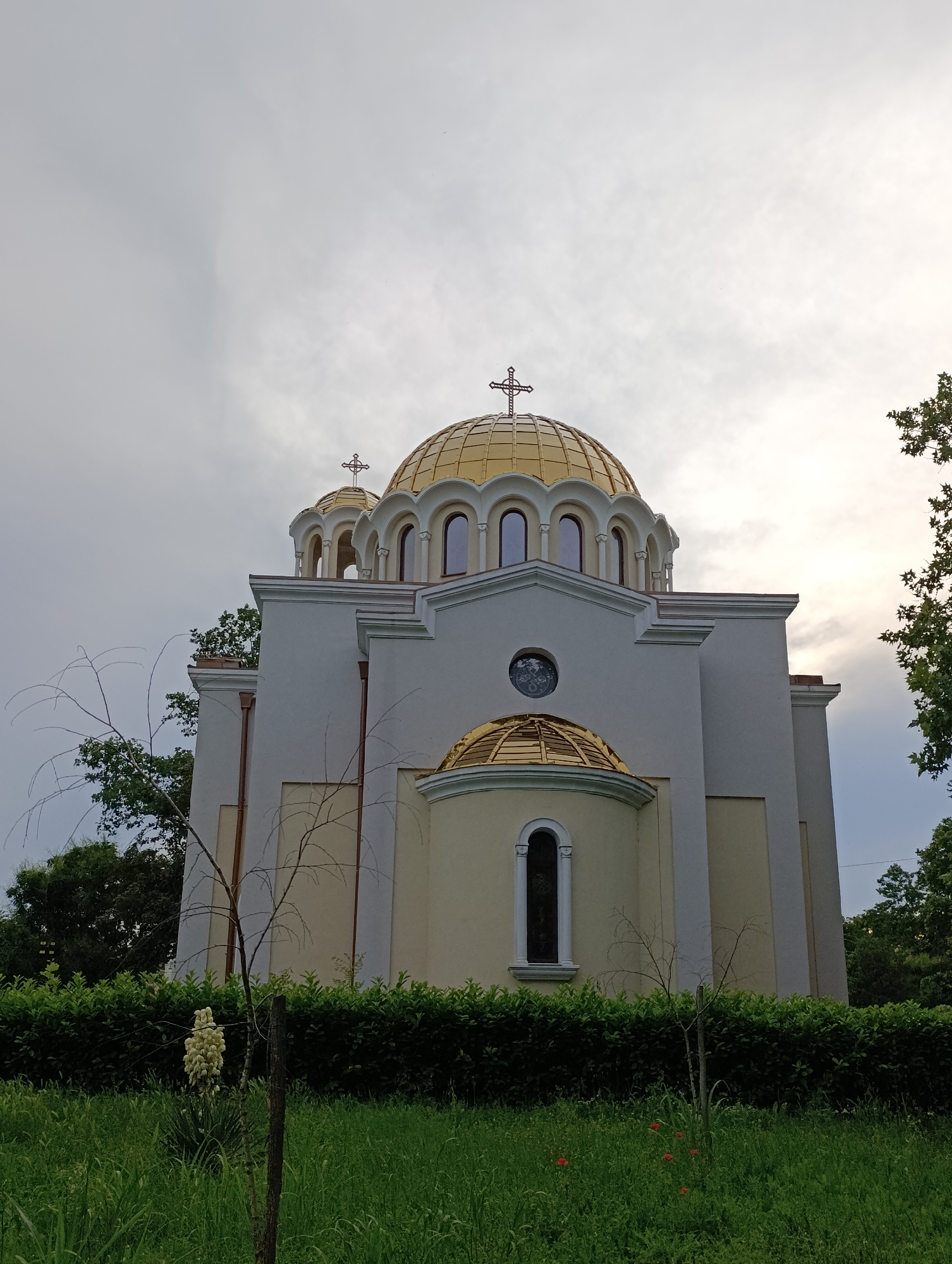 Afternoon walk captures Orthodox church, dogs, flowers in Eastern Europe
