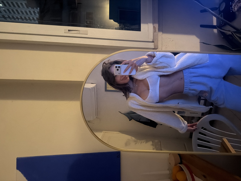 Young woman photographed at multiple indoor Tel Aviv locations