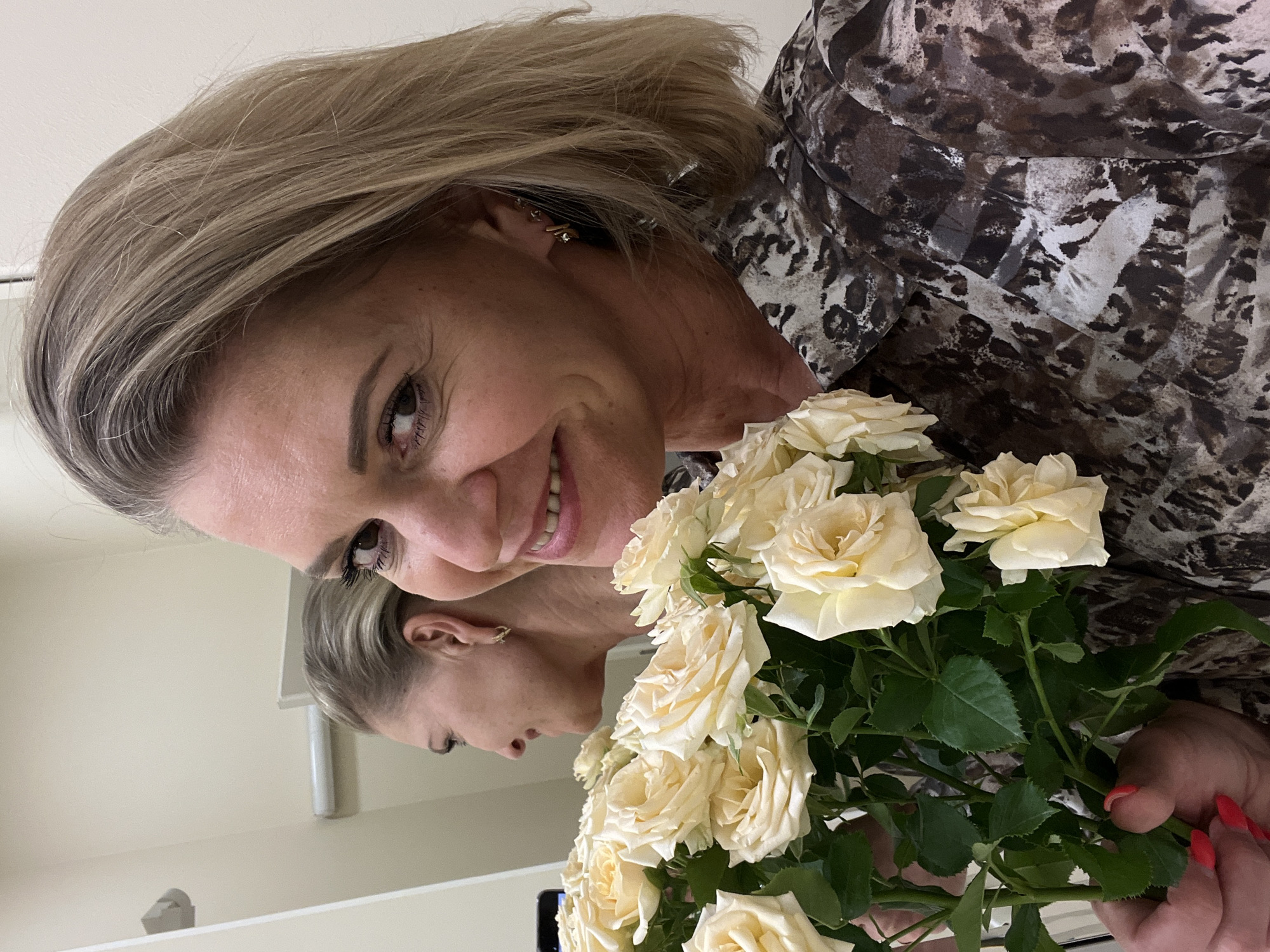 Woman receives flowers, gifts in Kaliningrad celebration moment
