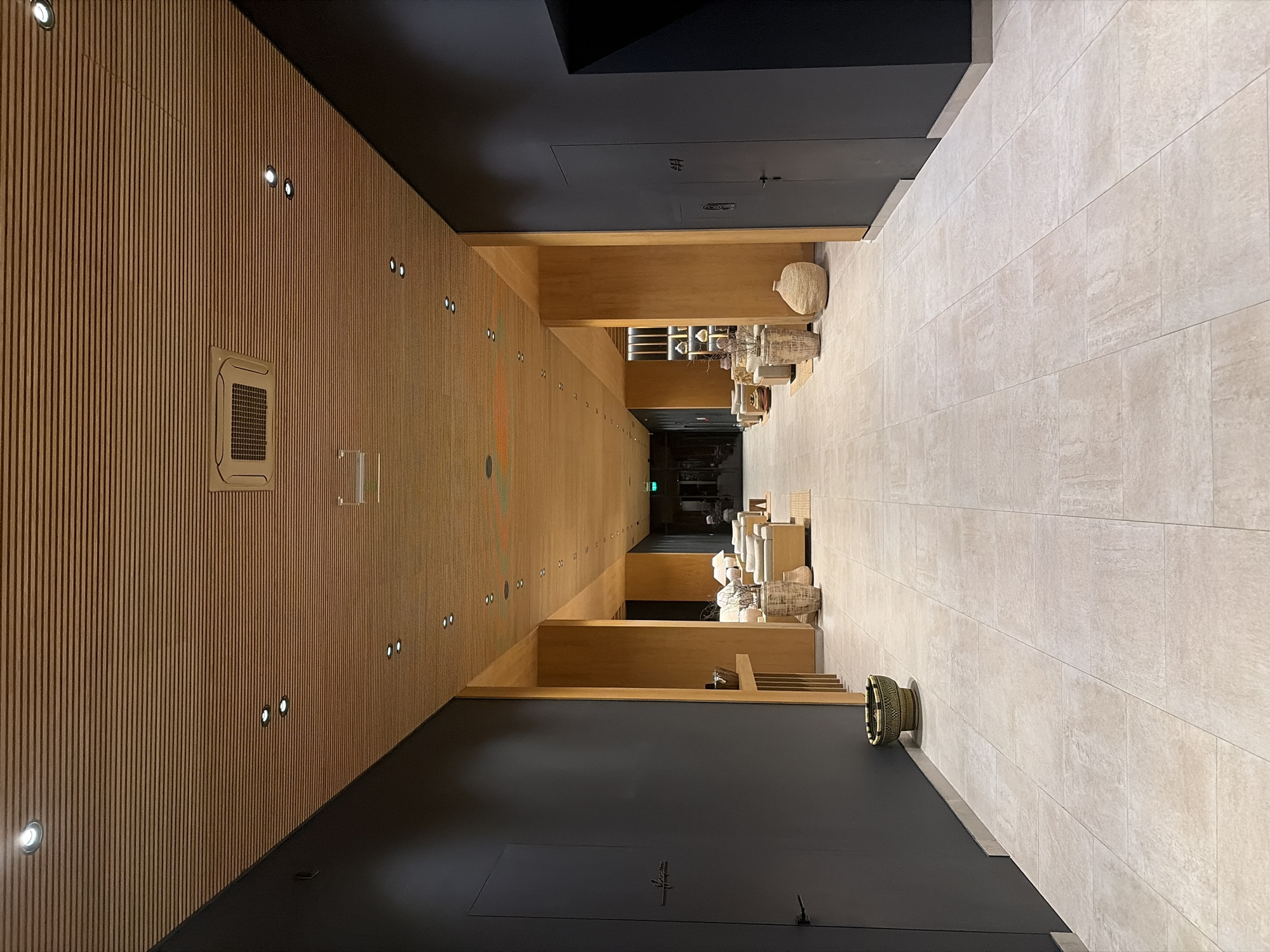 Museum visitor documents art and pottery exhibits in Svilengrad