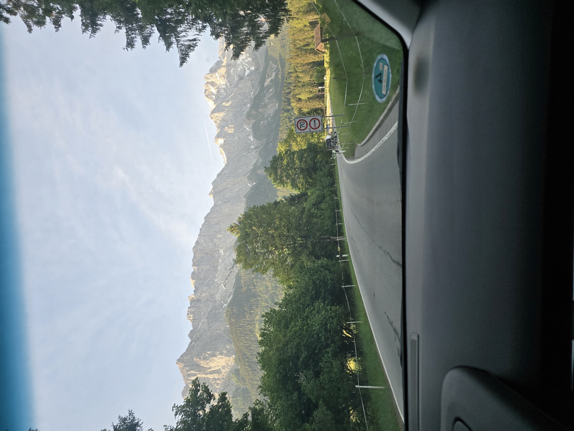 Morning drive through Grainau's mountain roads captured on dashboard