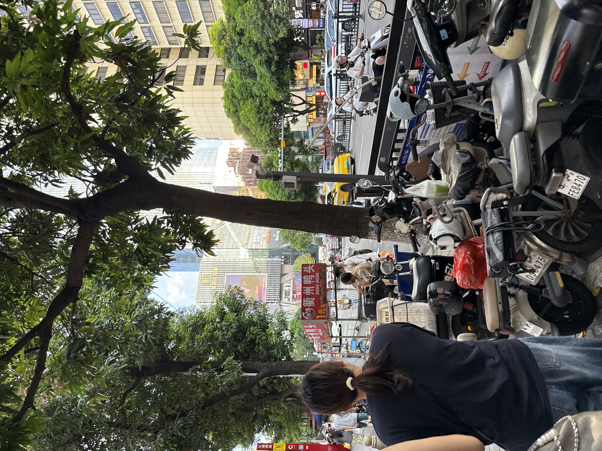 Street market bustle and subway commuting in Haizhu District