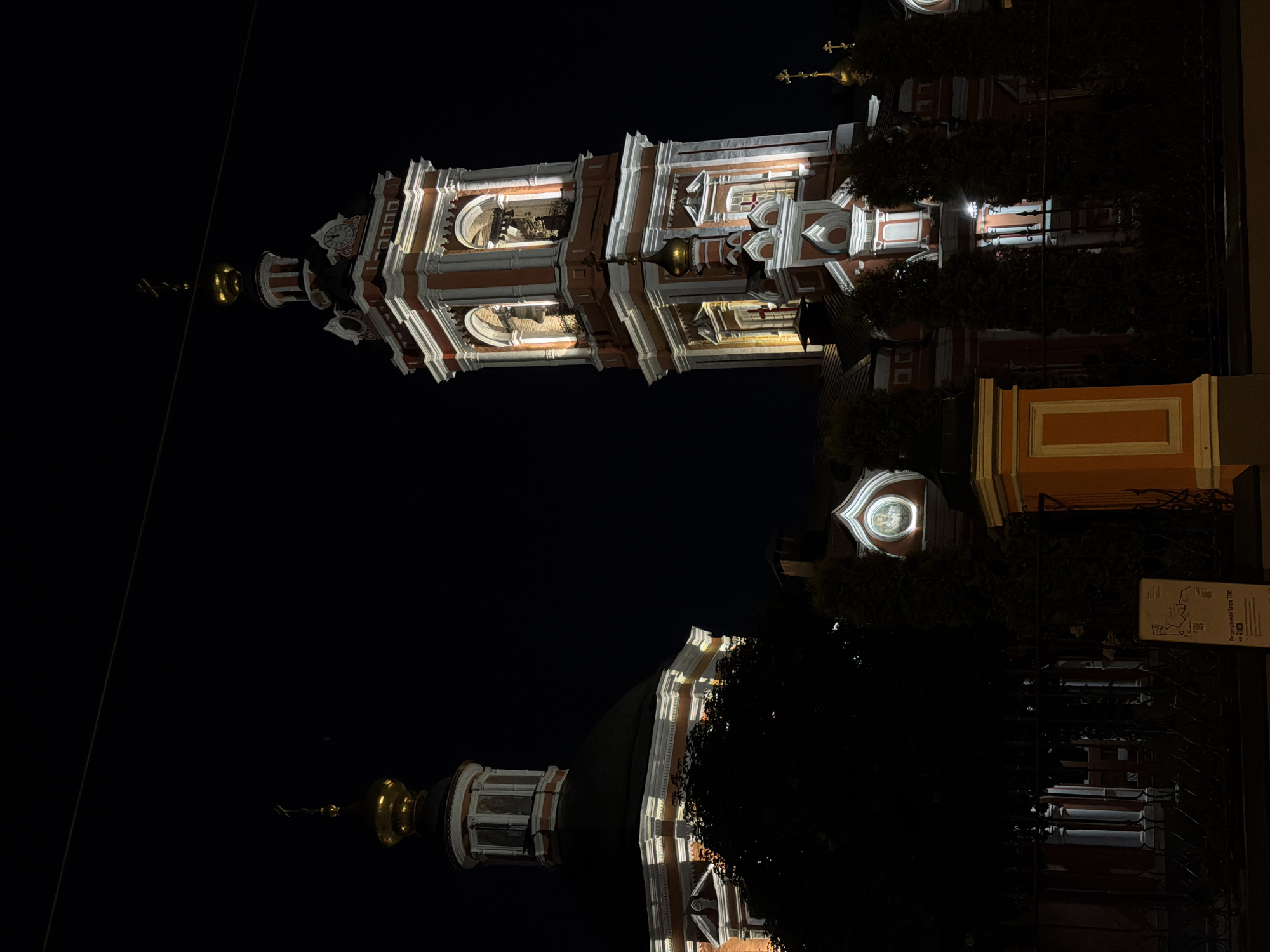 Moscow evening scenes show illuminated churches, street gatherings, restaurant activity