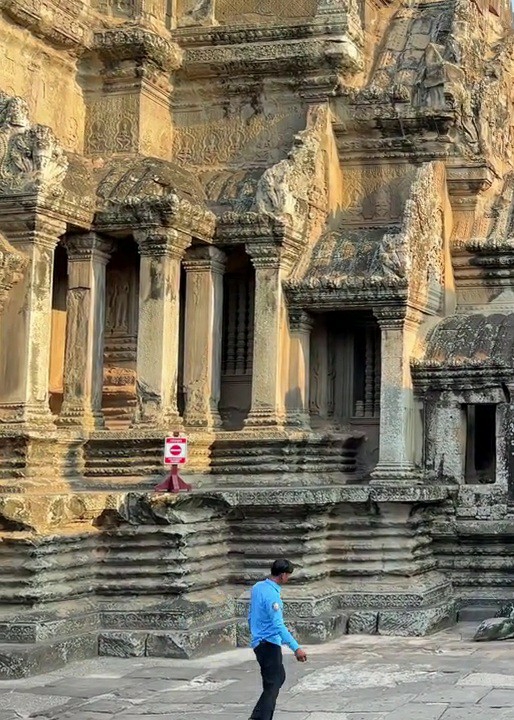 Early morning tourism activity documented at Angkor Wat complex