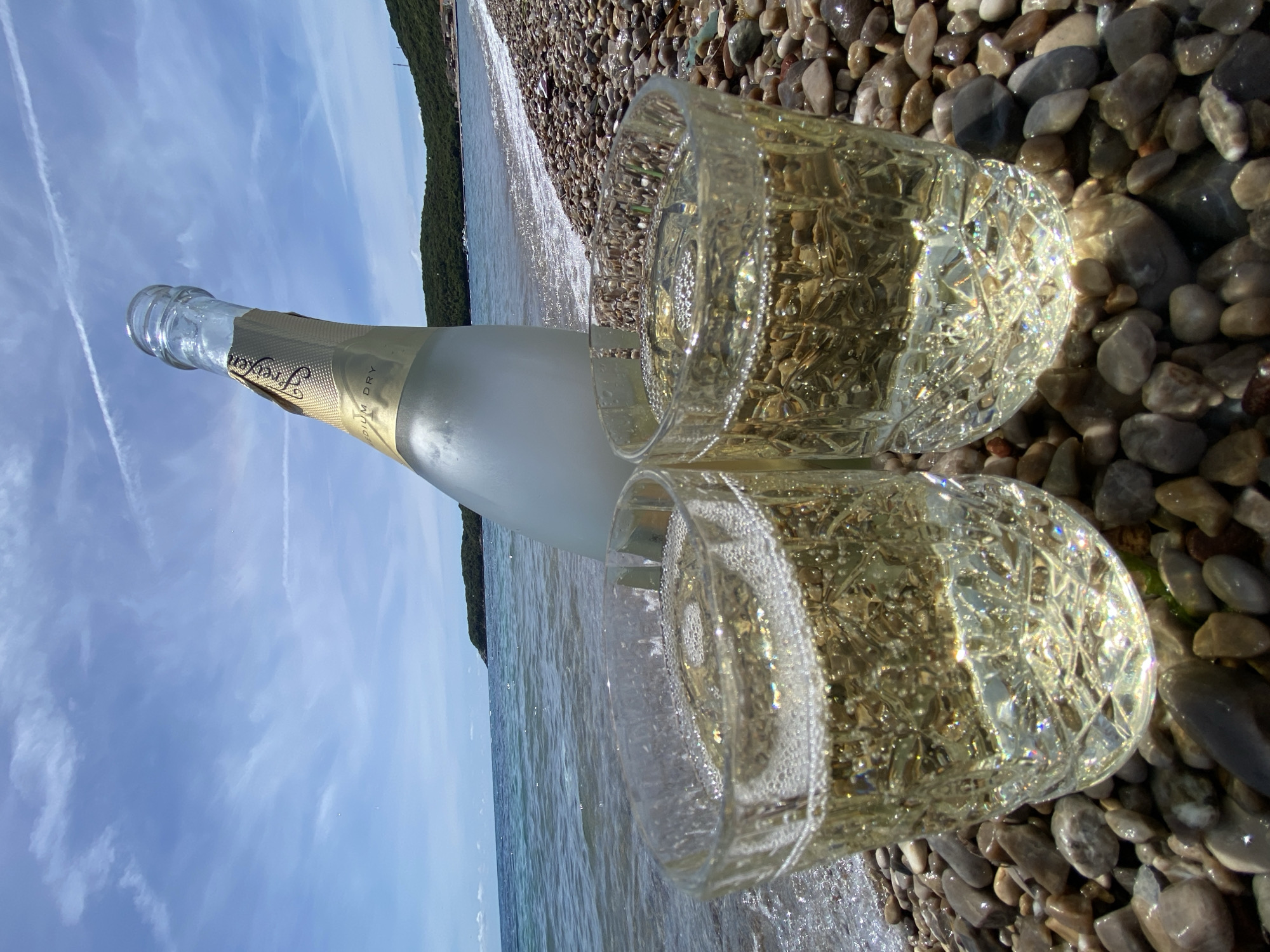 Sparkling wine enjoyed on Montenegro's Prijevor beach morning