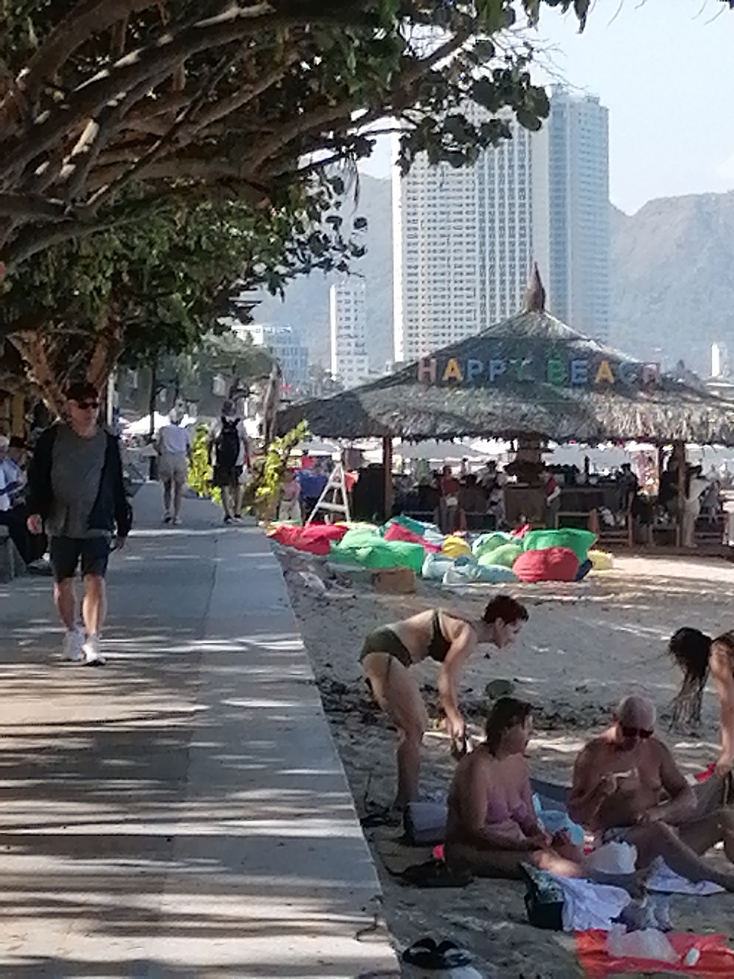Morning walk captured along Nha Trang beachfront walkway