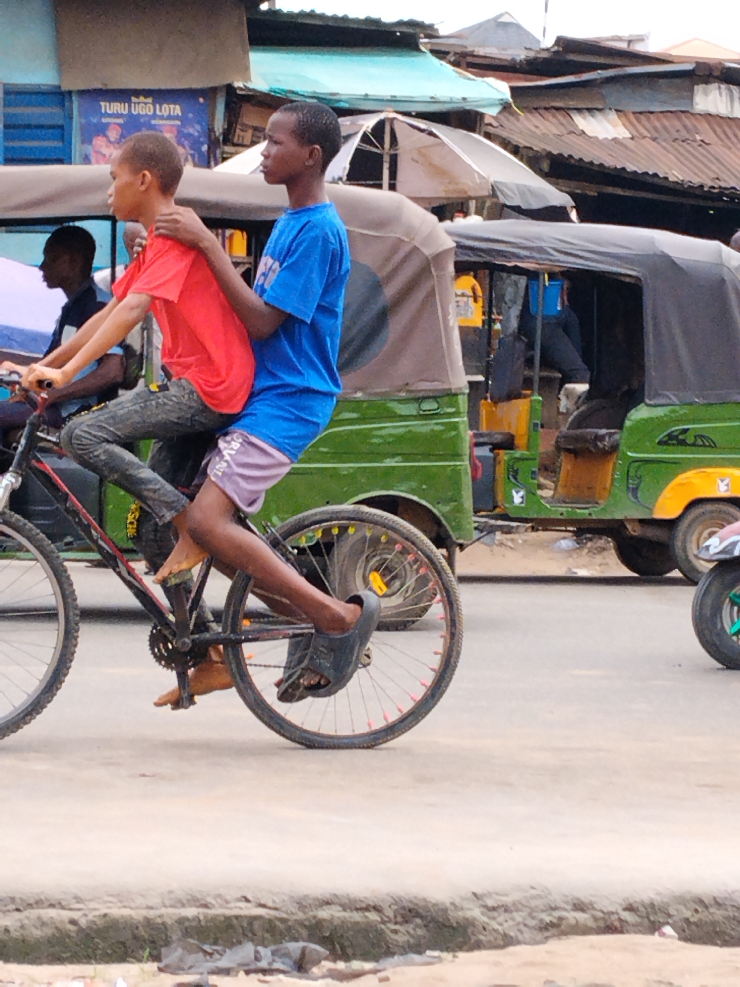 Daily street life documented across Aba, Nigeria afternoon