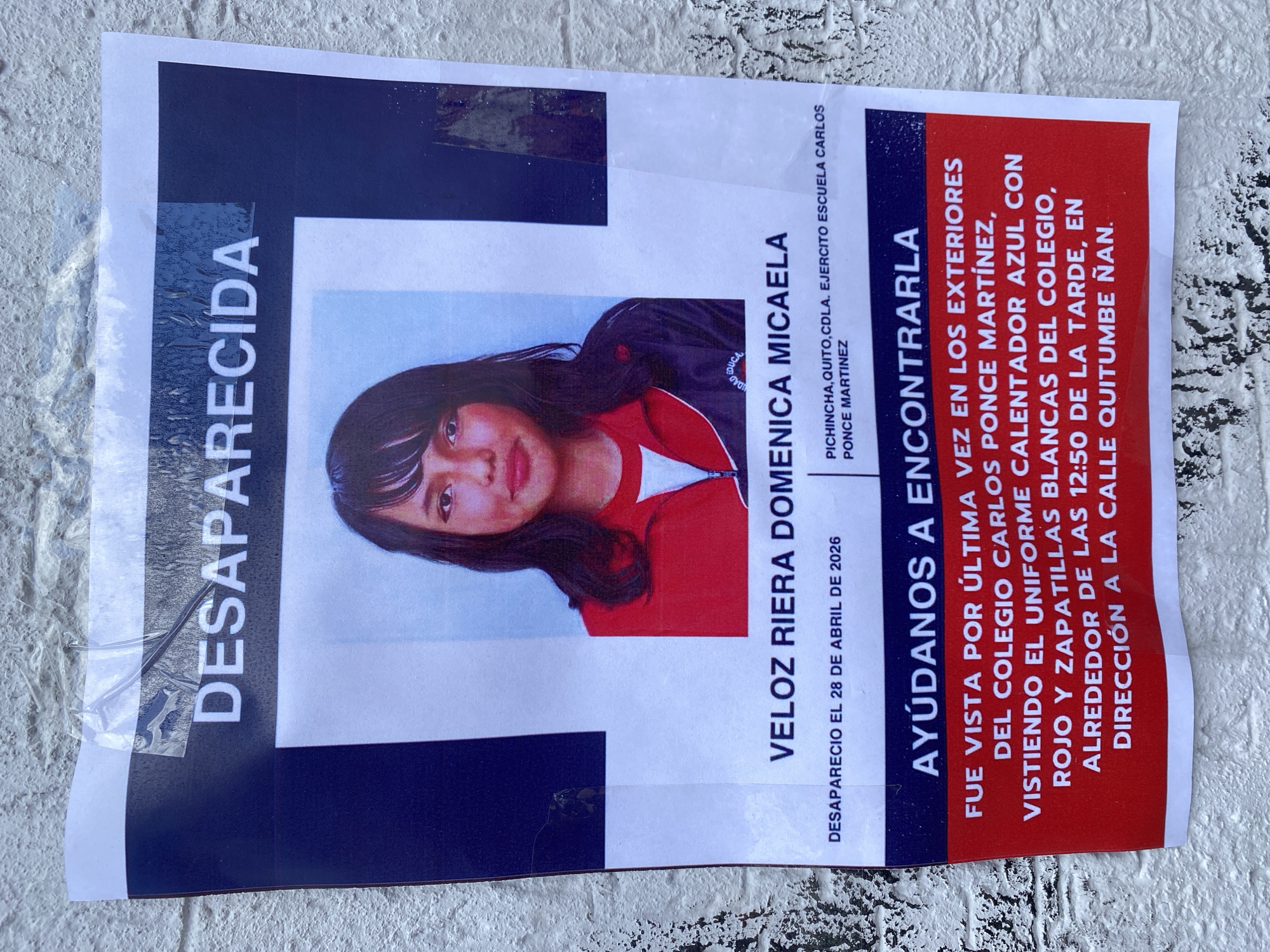 Missing person poster and street scene documented in Quito
