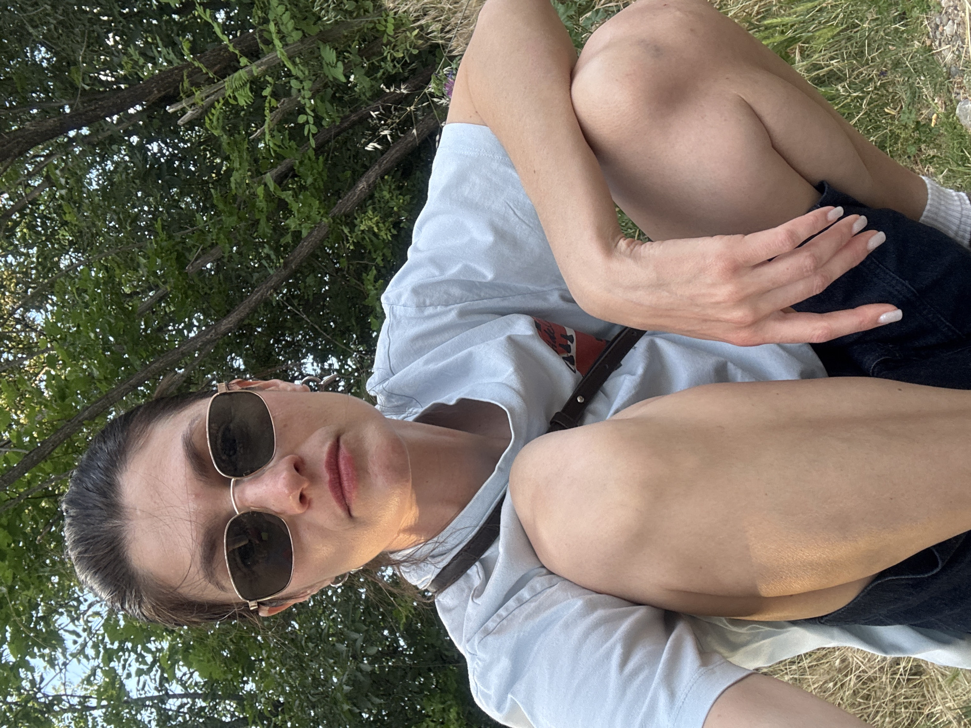 Woman and child enjoy afternoon with dogs in Podgorica