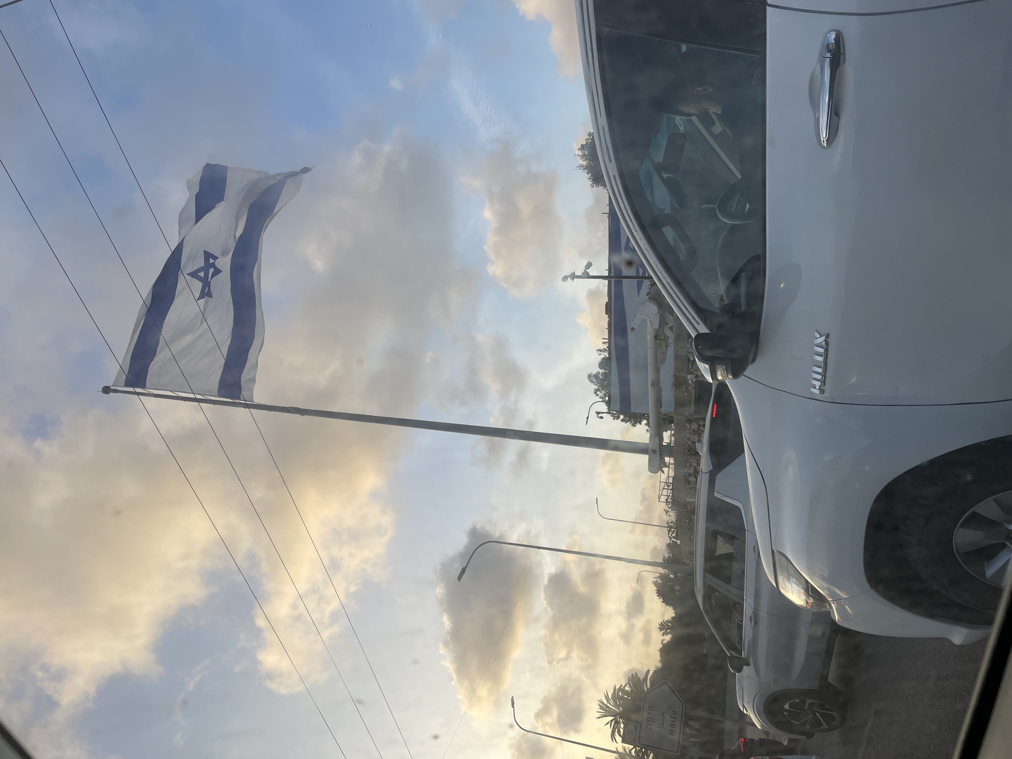 Israeli flag observed on busy street in Herzliya area