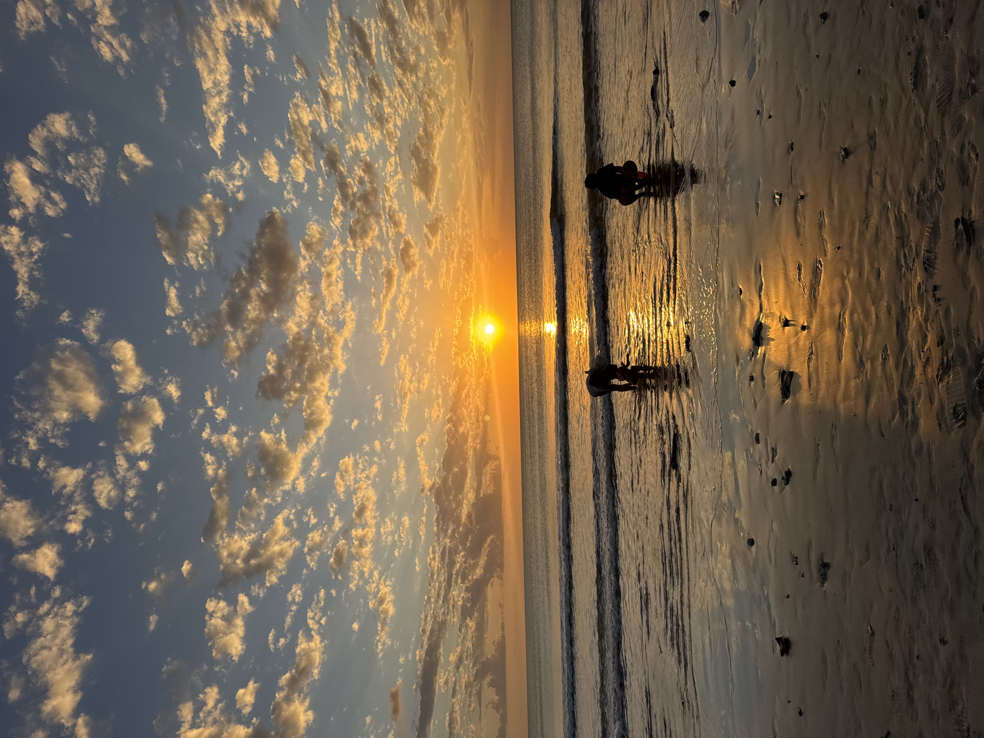 Sunset beach scenes at Kuta Selatan, Bali