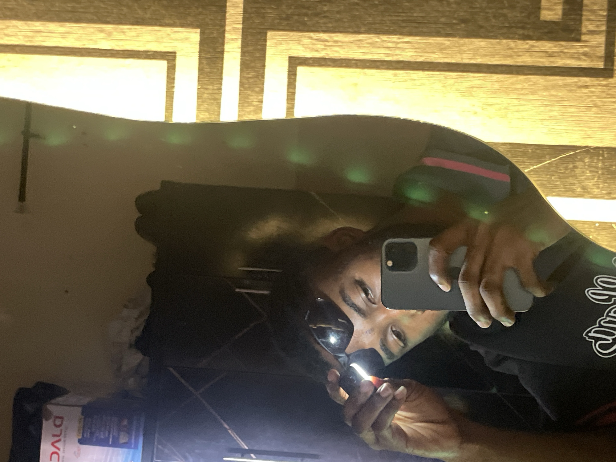 Man takes mirror selfies in Lokoja, Nigeria residence
