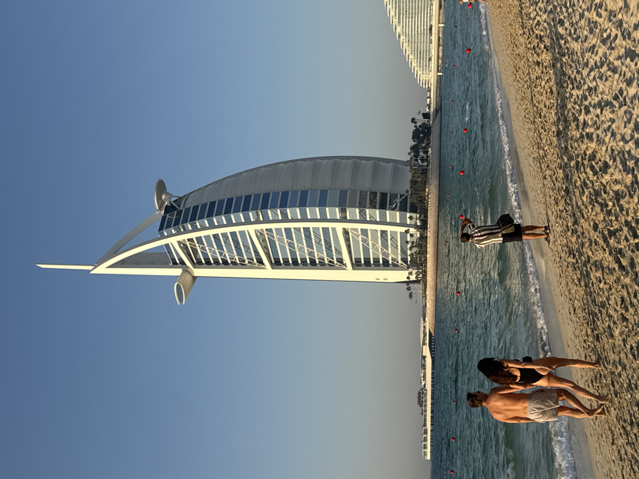 Tourist moments captured at Dubai's Jumeirah Beach near Burj Al Arab