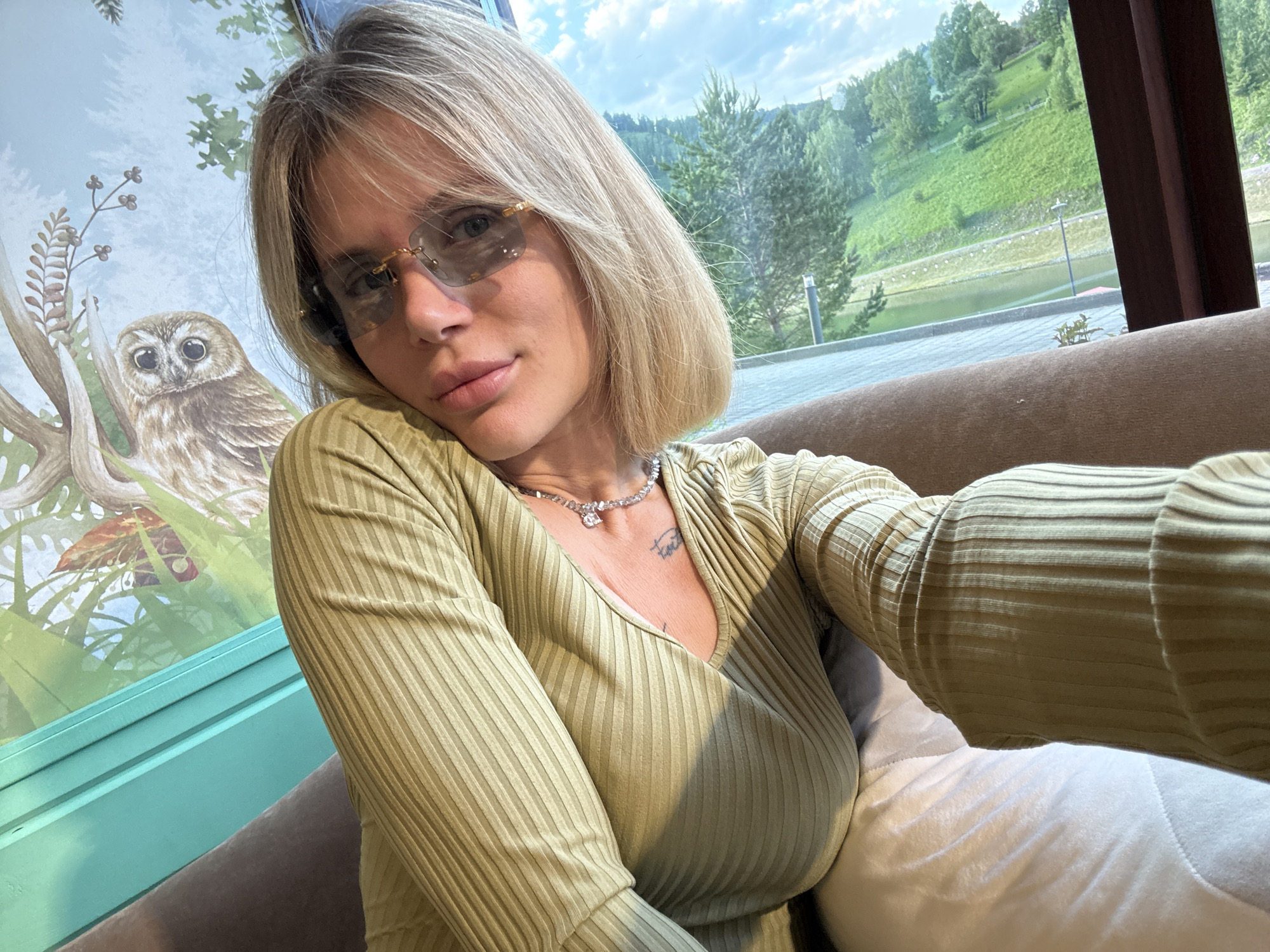 Woman takes indoor selfies in Urlu-Aspak, Russia