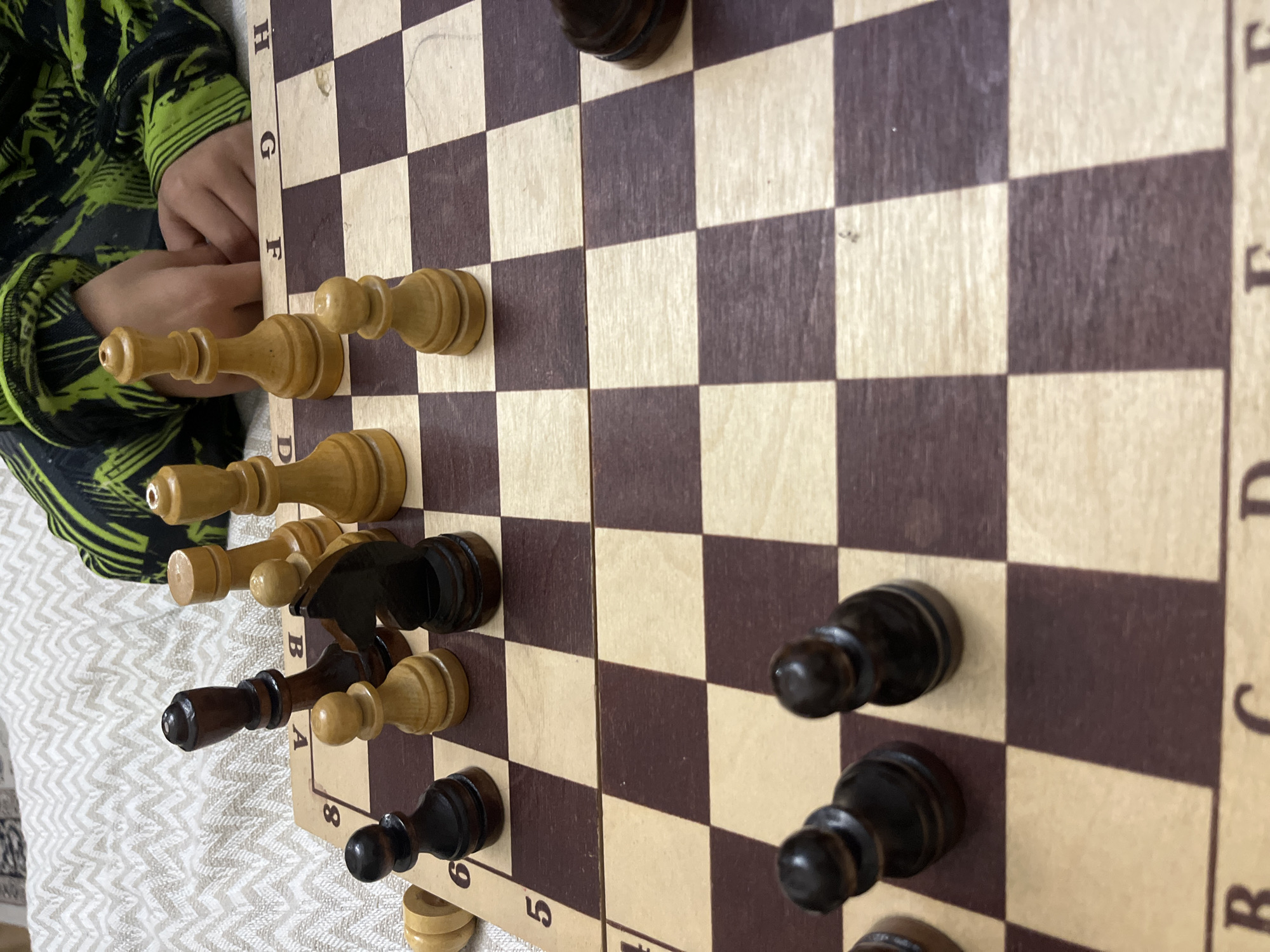 Child plays chess game in Kaspiysk, Russia
