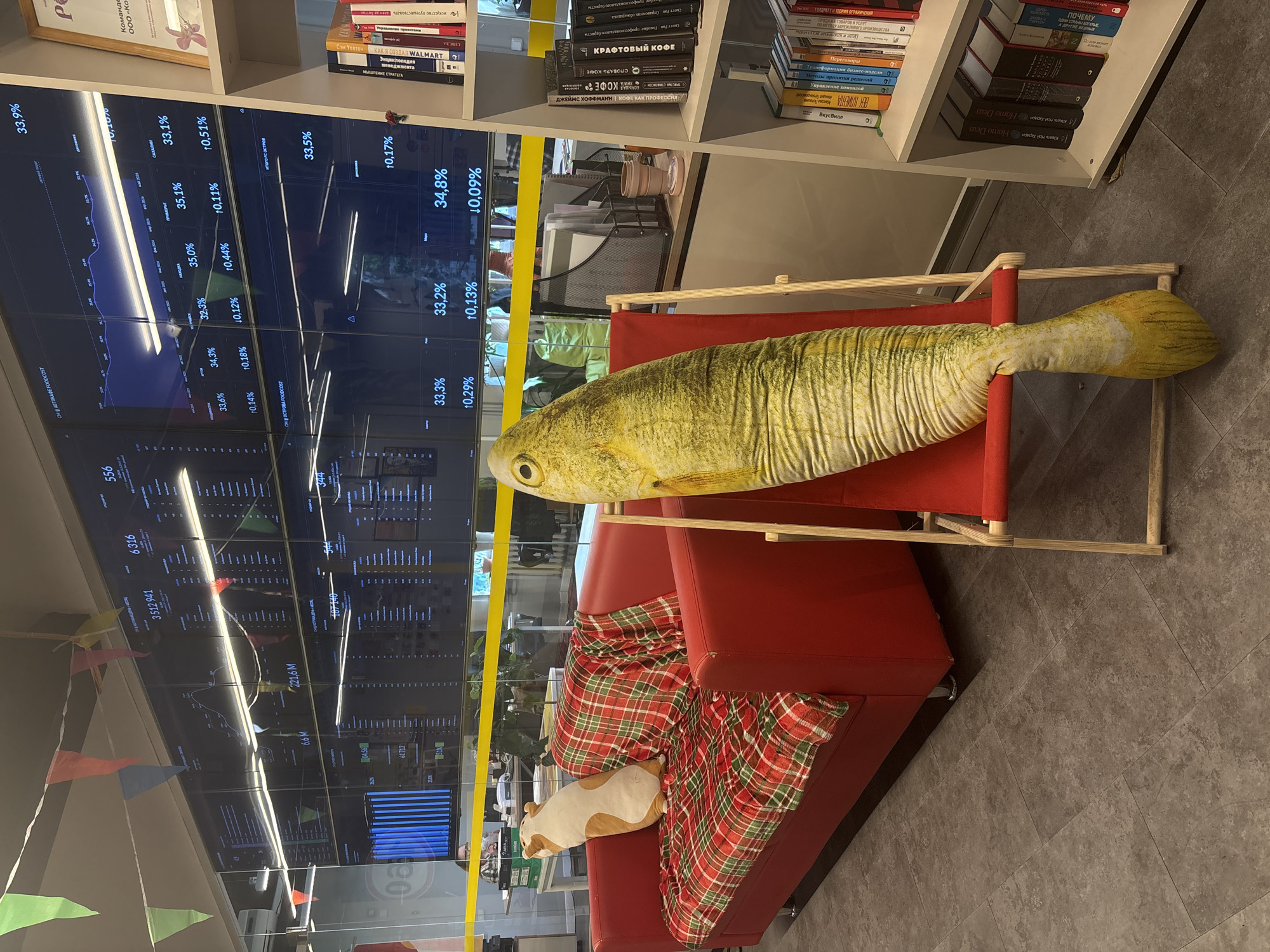 Woman takes selfie in modern Vladivostok office lounge