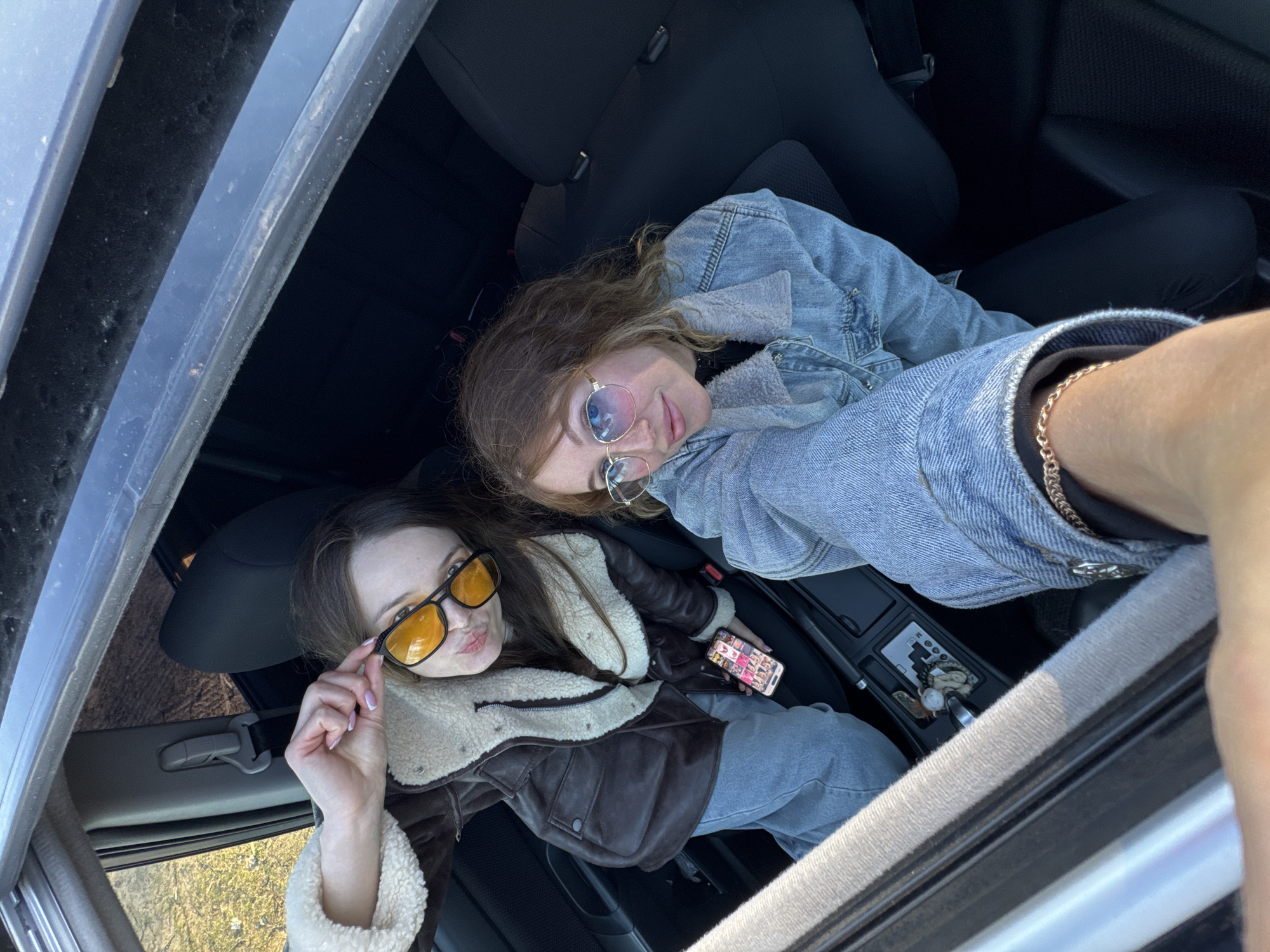 Two women enjoy afternoon beach outing in Noviy, Russia