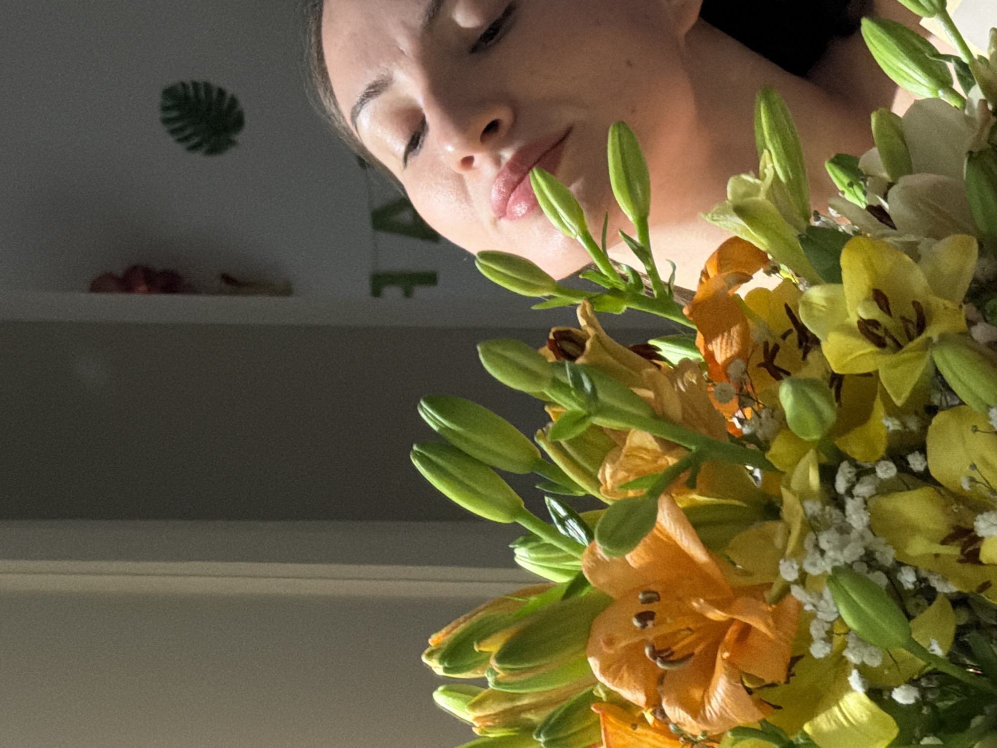 Bathroom selfie session with a fresh bouquet of lilies