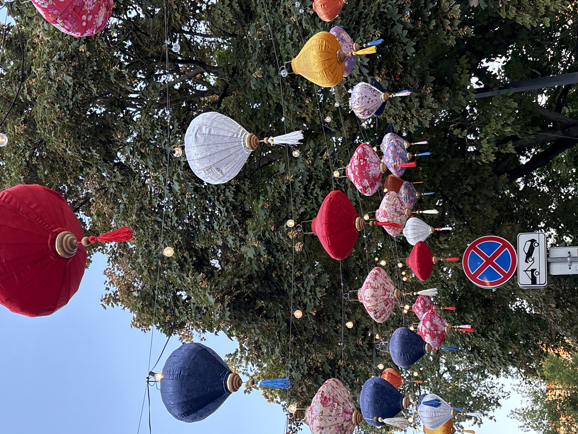 Colorful lanterns strung across a Kaliningrad street