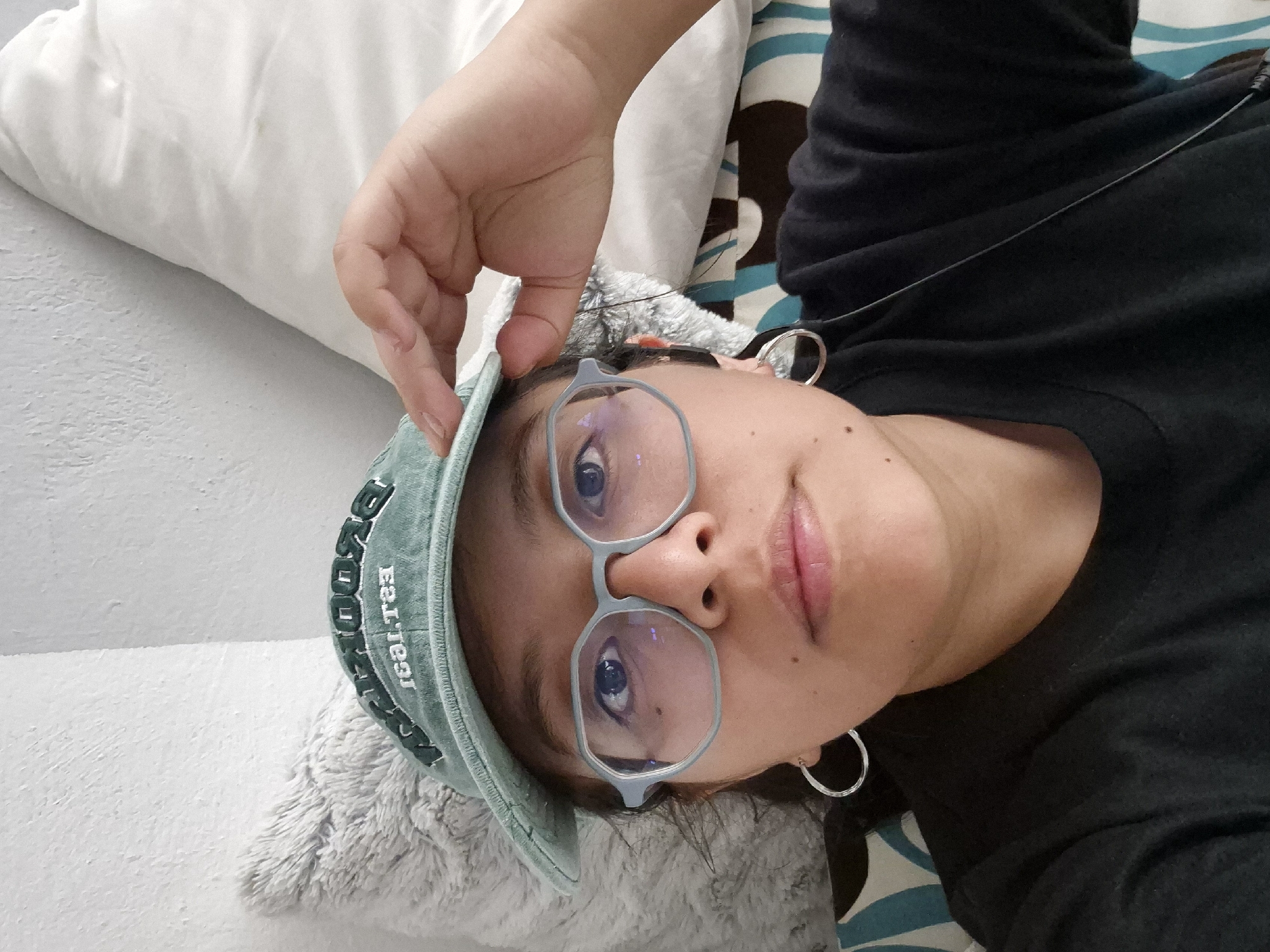 Person resting in bed observed in Puebla, Mexico