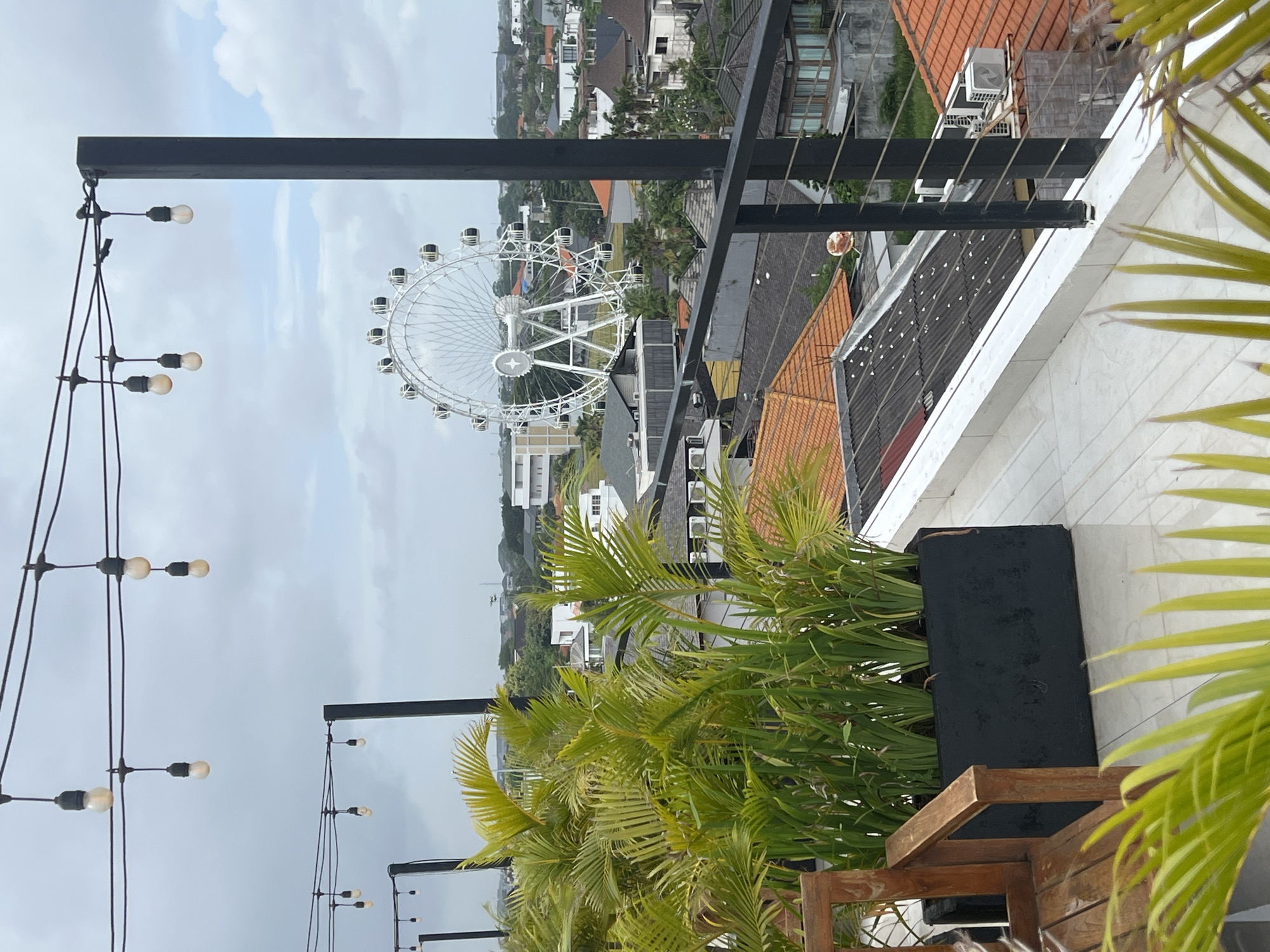 Rooftop views capture North Kuta's tropical cityscape and attractions