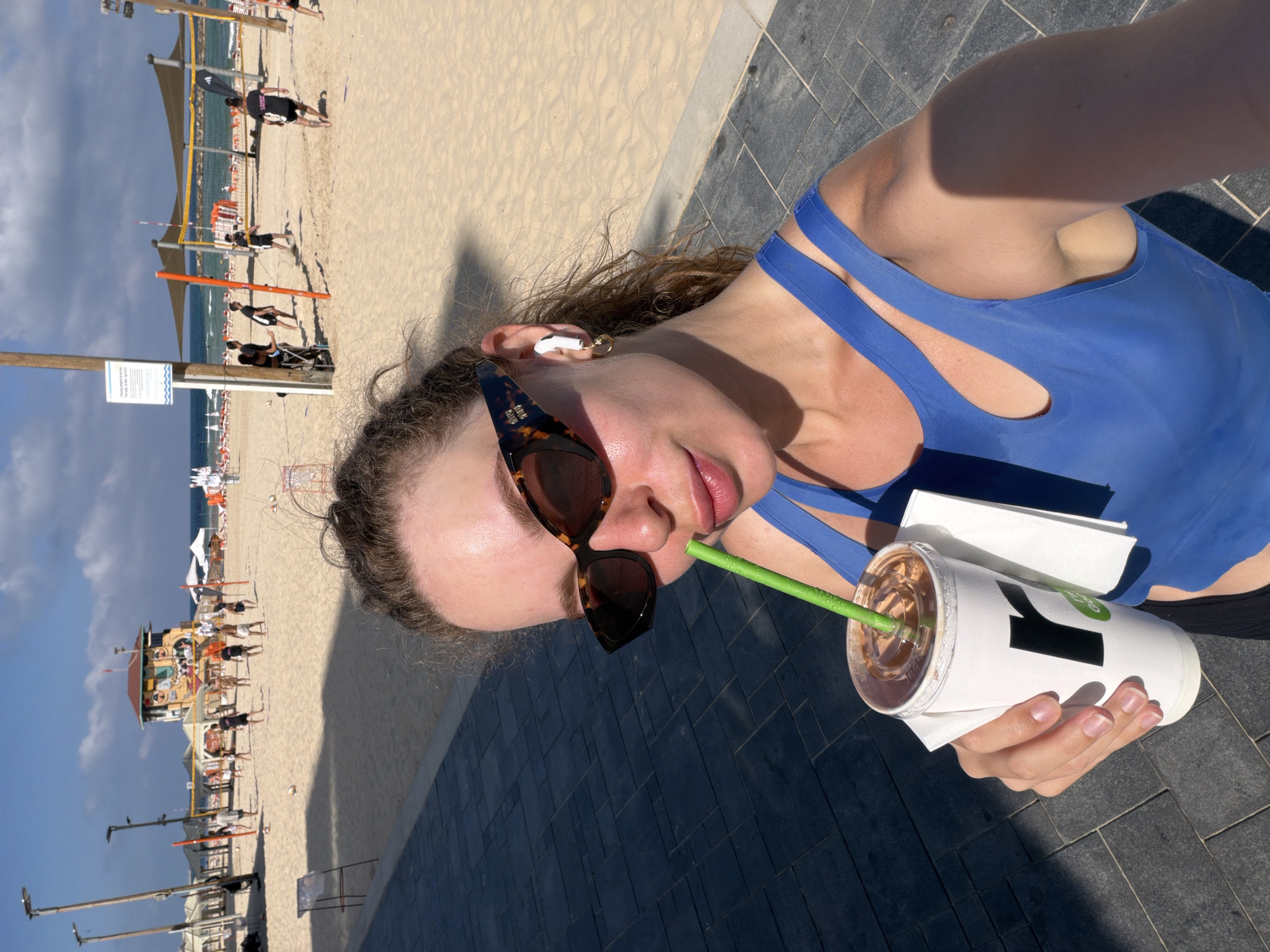 Early morning at Tel Aviv beach: volleyball, sea views, and coffee