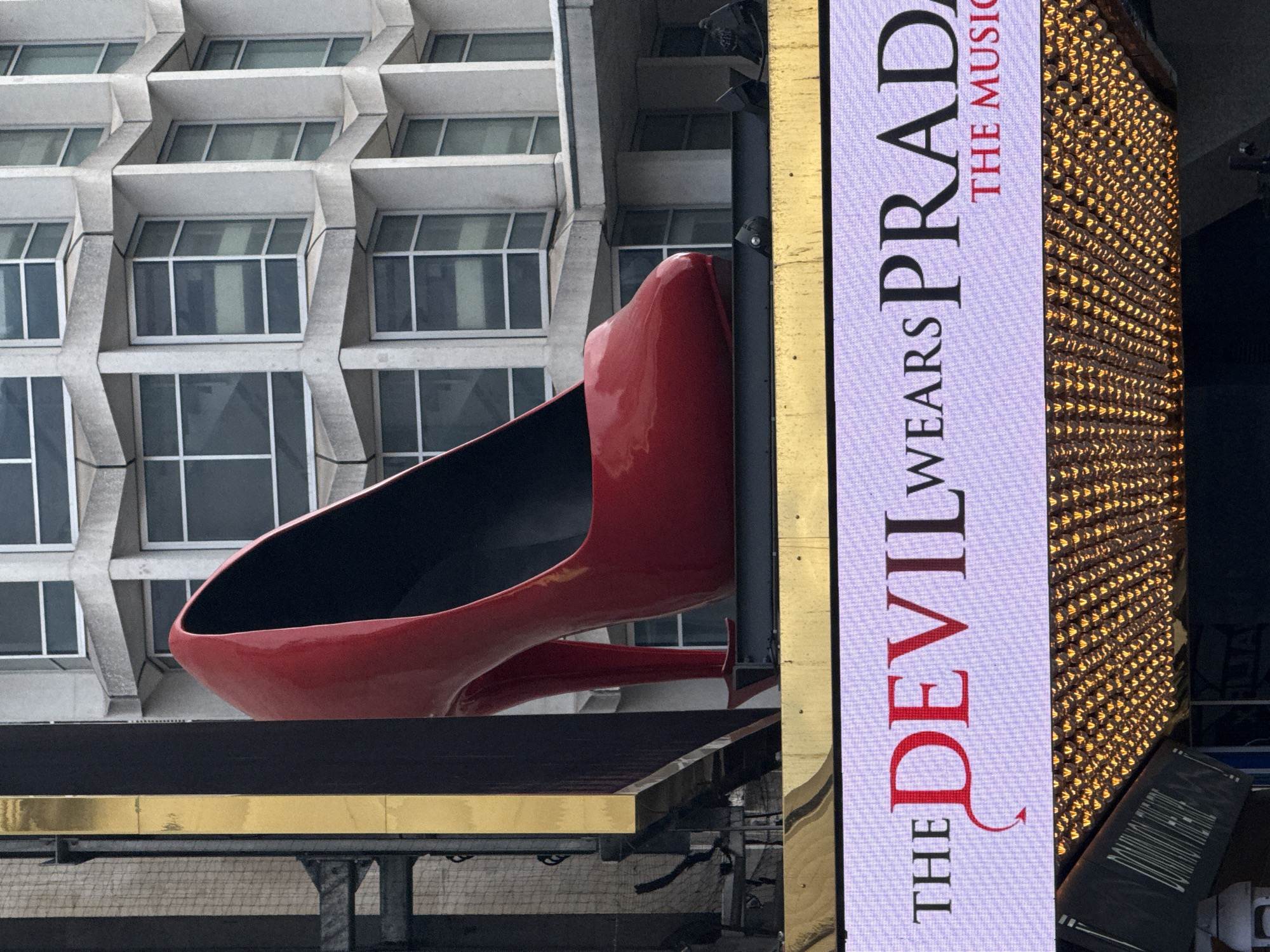 London witness documents red shoe sculpture, commercial storefronts